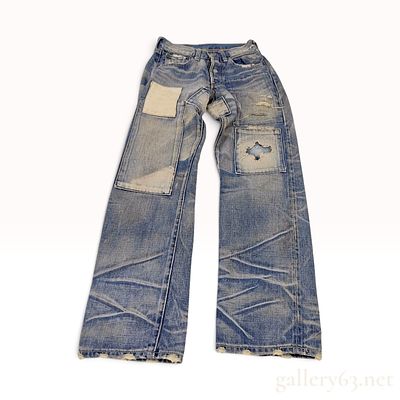 C. 2004 Levi Strauss Japan 66501 Distressed Patchwork Denim Jeans W27 L29. This pair of Levi 