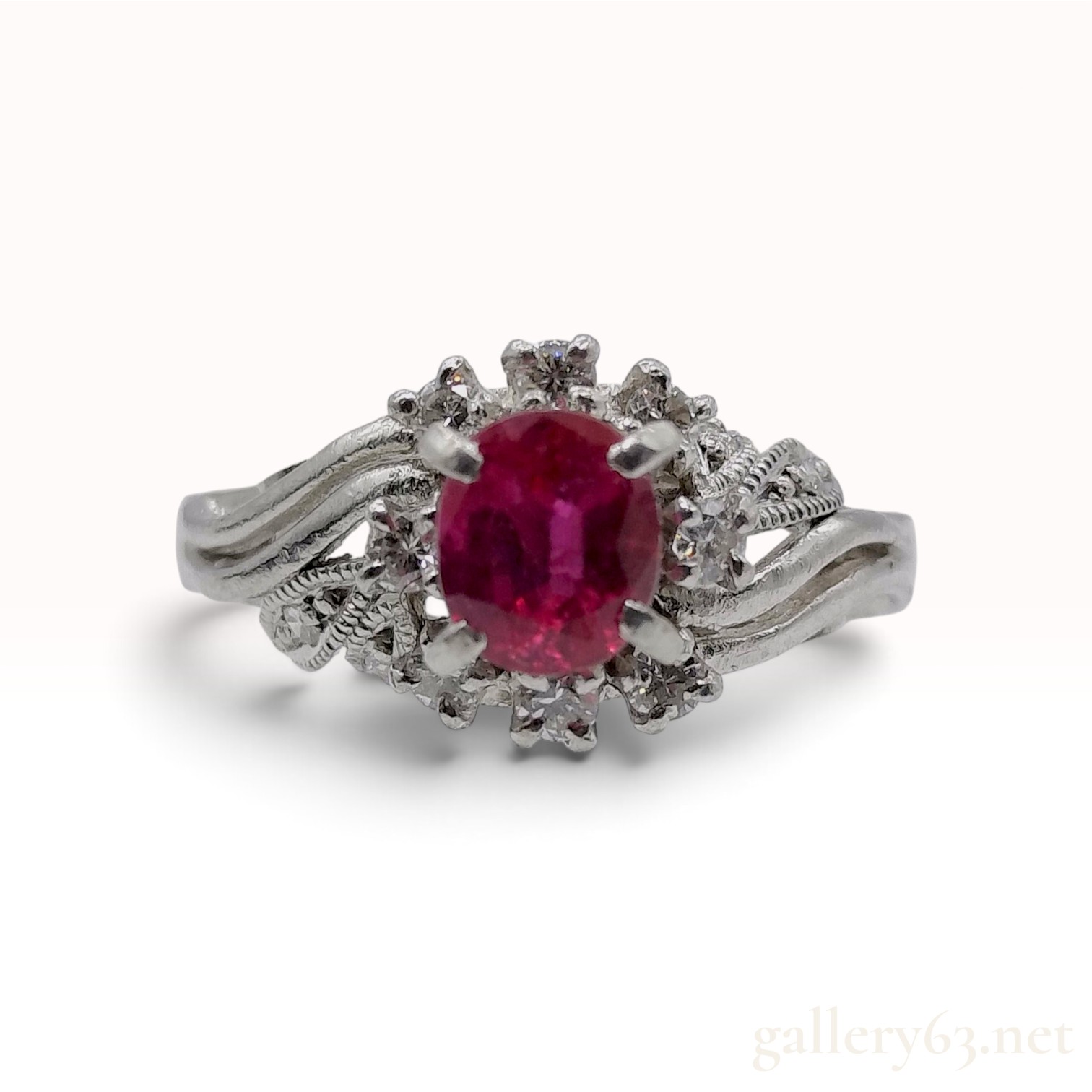 A Vintage Platinum 0.62ct Ruby and 0.21ctw Natural Diamond Cocktail Ring