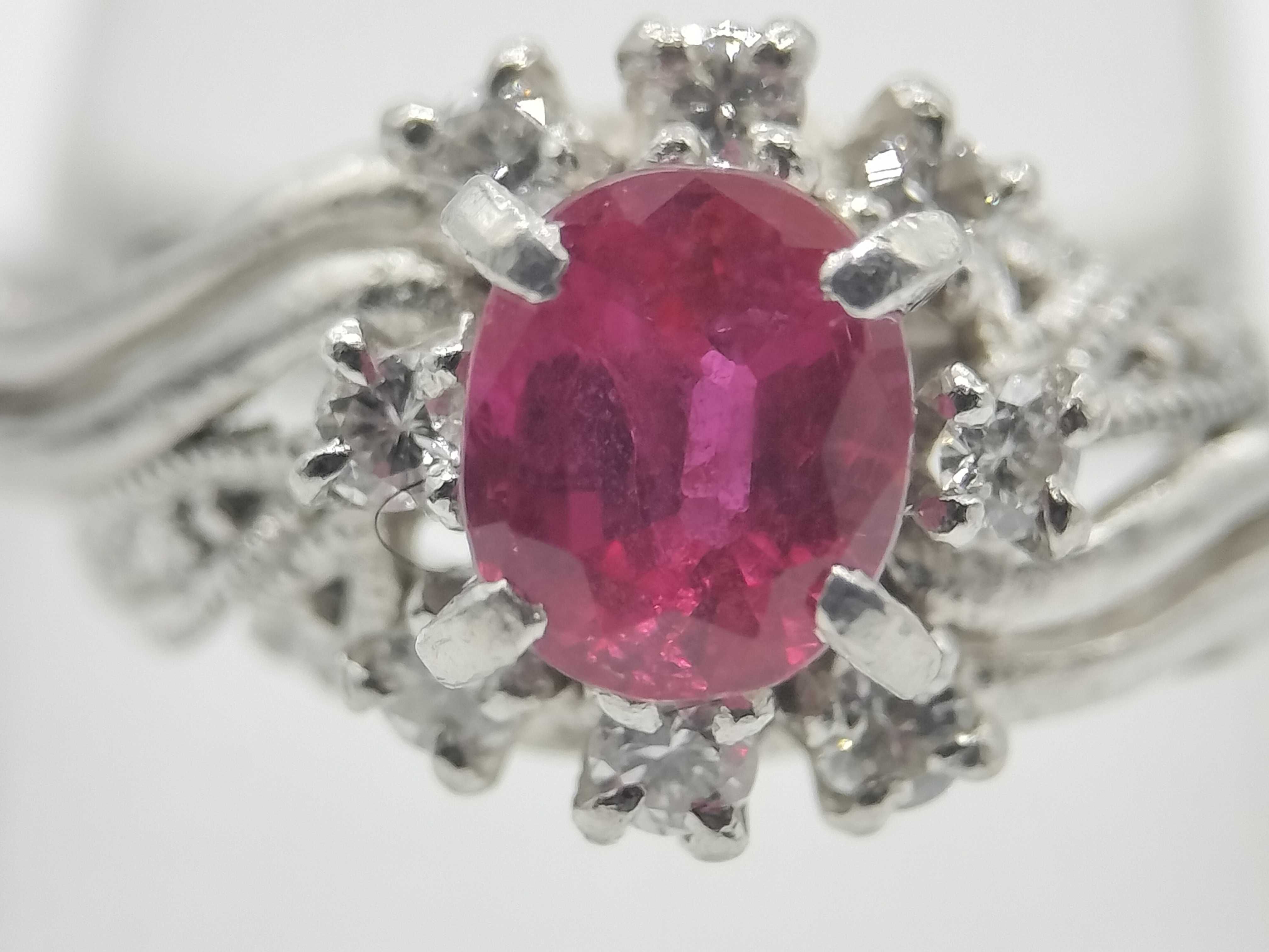 A Vintage Platinum 0.62ct Ruby and 0.21ctw Natural Diamond Cocktail Ring