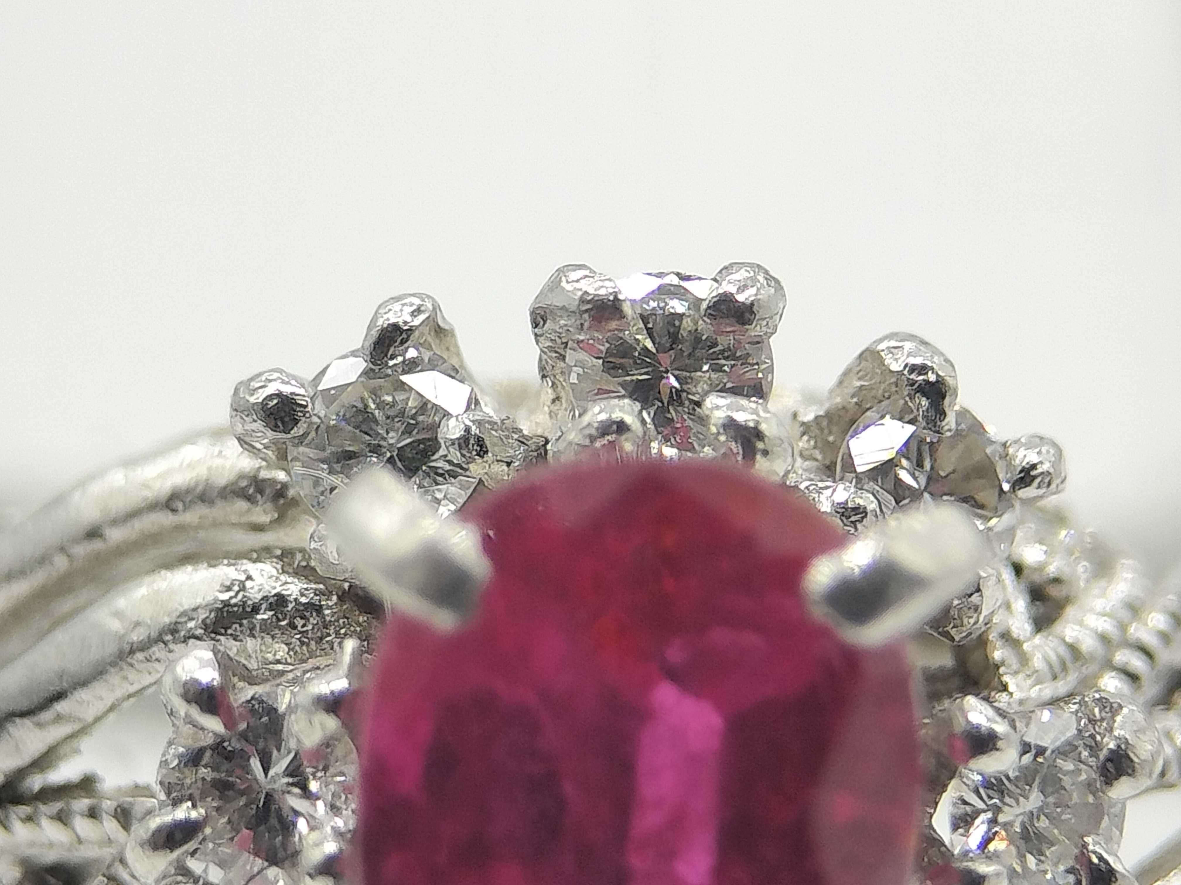 A Vintage Platinum 0.62ct Ruby and 0.21ctw Natural Diamond Cocktail Ring