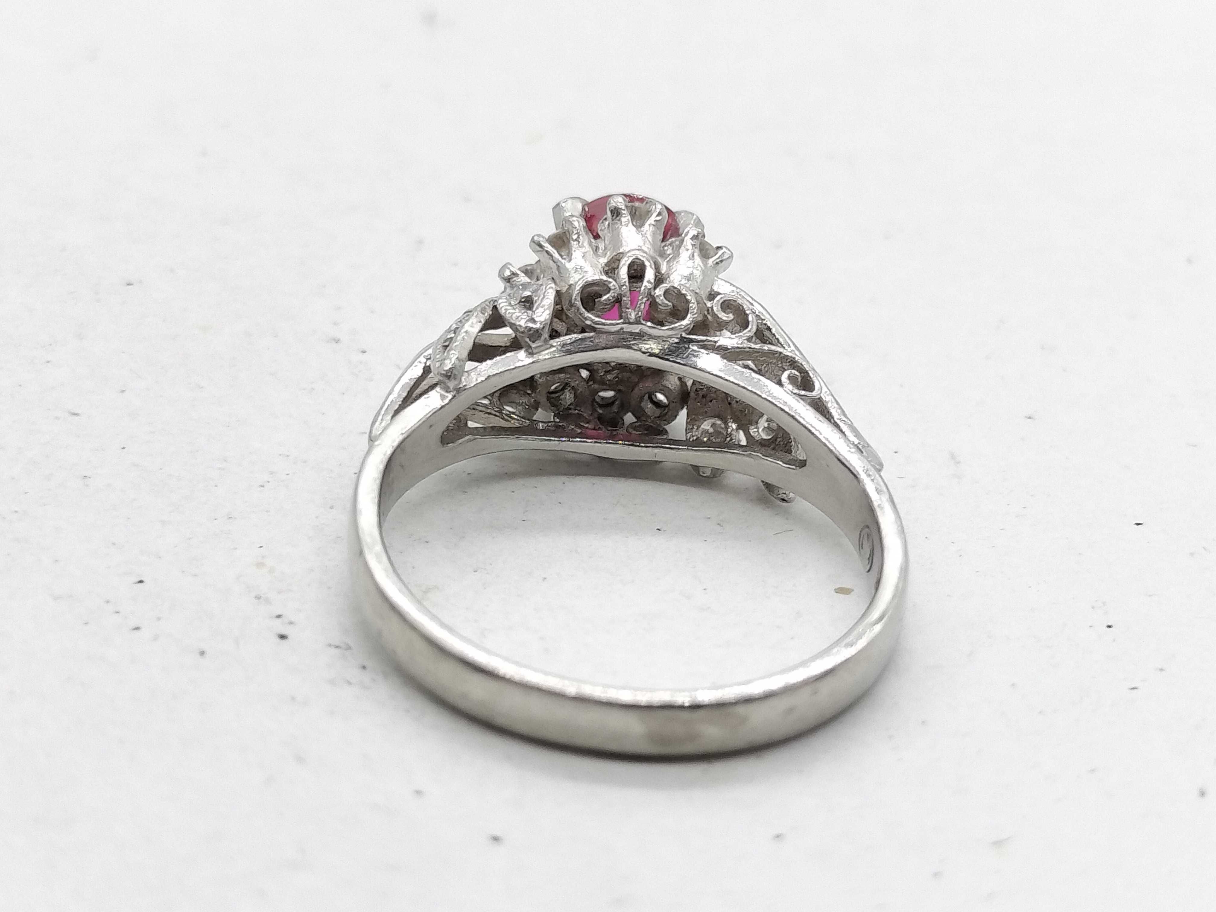 A Vintage Platinum 0.62ct Ruby and 0.21ctw Natural Diamond Cocktail Ring
