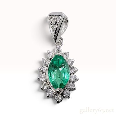 Pt900 0.79ct Natural Emerald and 0.34ctw Natural Diamond Halo Pendant. This pendant is crafted 