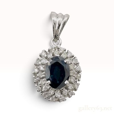 Platinum 1.01ct Sapphire and 0.18ctw Natural Diamond Halo Pendant. This platinum pendant 