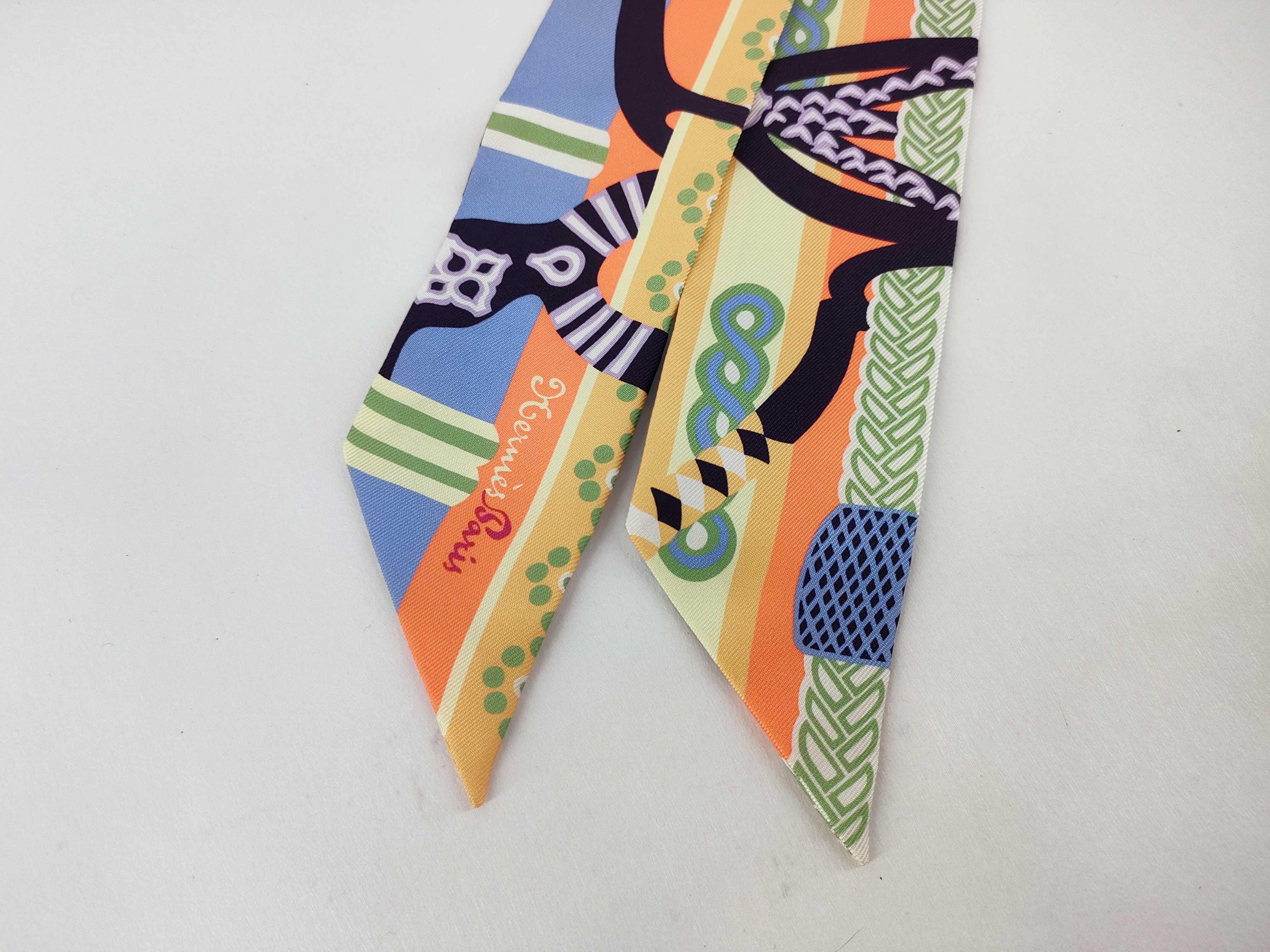 Hermes Orange and Navy Equestrian Motif Silk Twilly Scarf