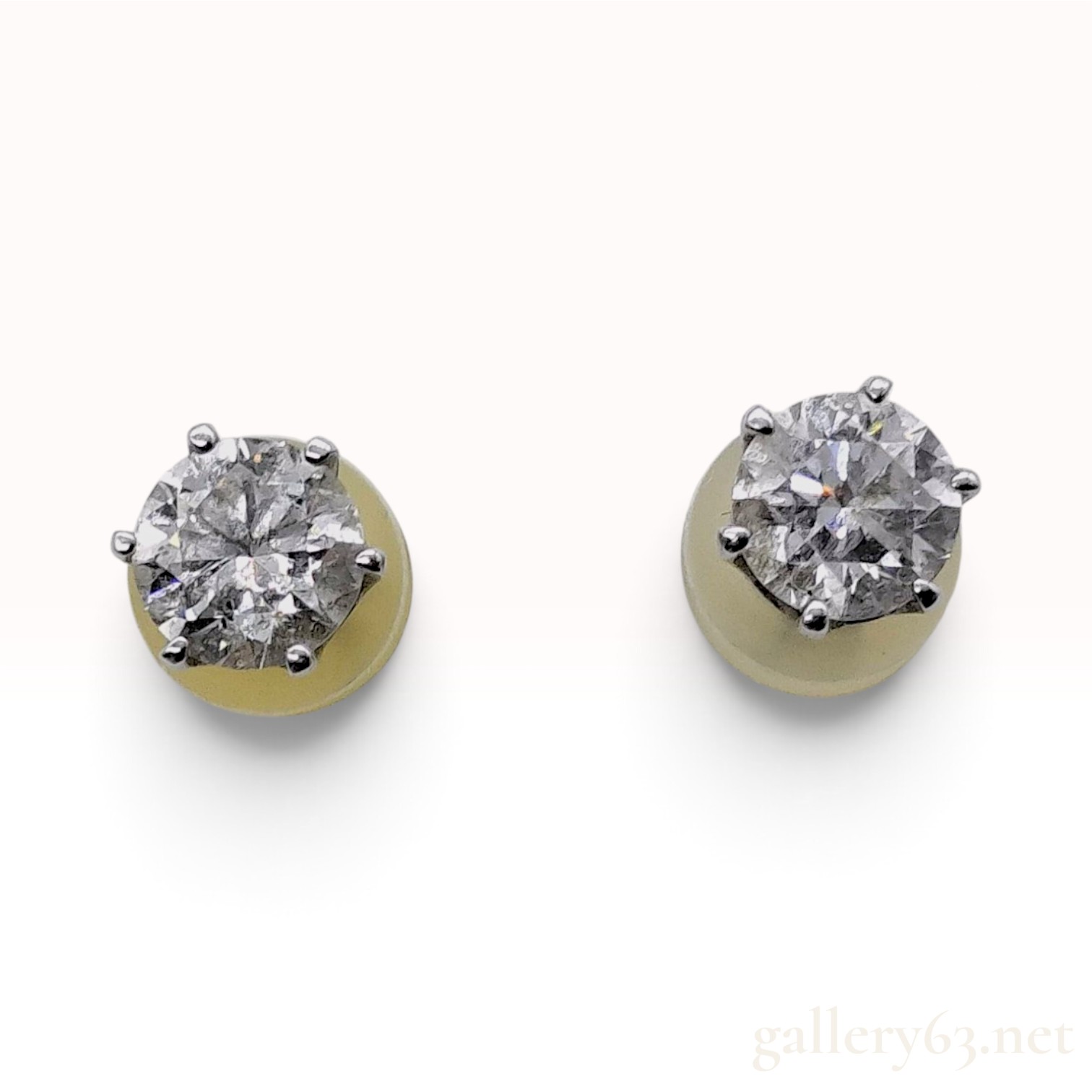 Platinum and 0.60ctw Natural Diamond Six-Prong Stud Earrings