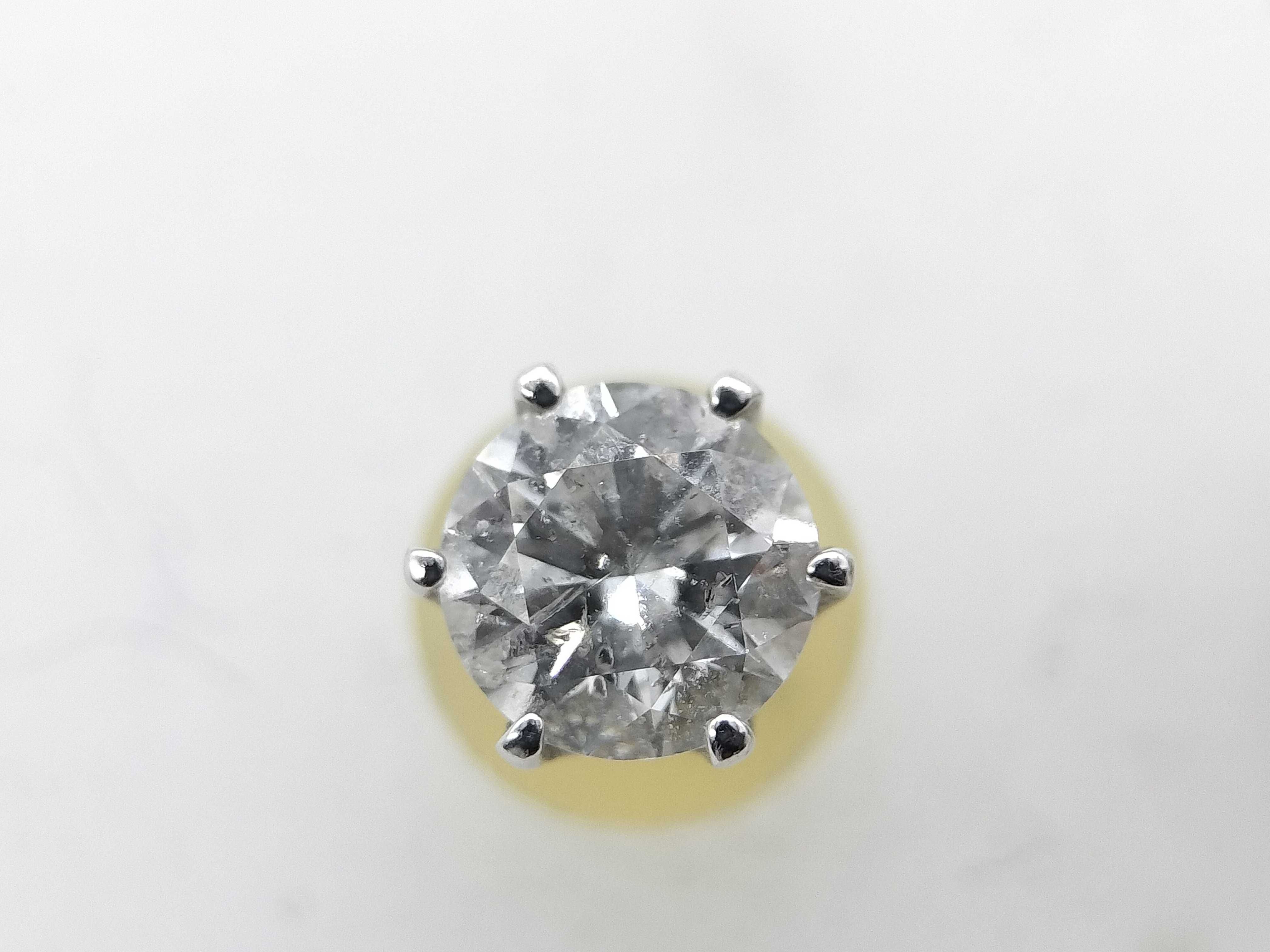 Platinum and 0.60ctw Natural Diamond Six-Prong Stud Earrings