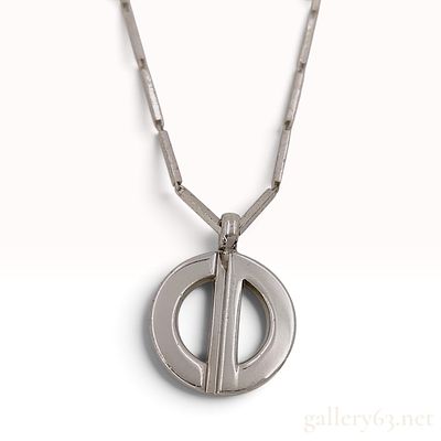 Vintage Christian Dior Modernist Pendant Necklace. This Christian Dior pendant necklace features 