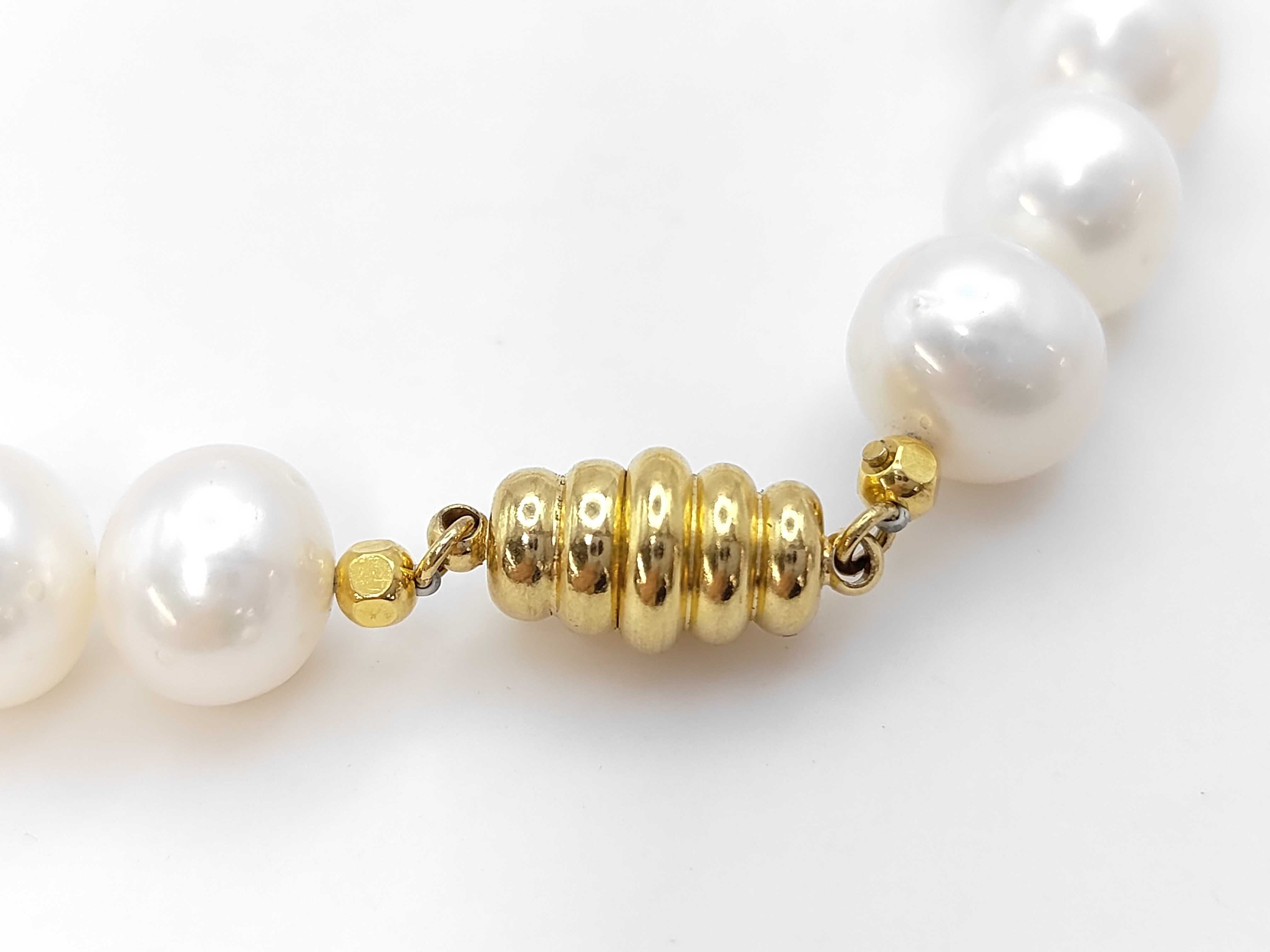 A Single Strand Cultured Pearl Necklace with Yellow Gold Toned Clasp