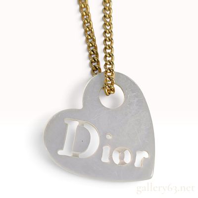 Christian Dior Heart Shell Logo Gold Tone Pendant Necklace. A Christian Dior pendant necklace 
