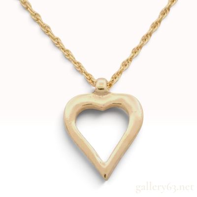 Vintage Christian Dior Open Heart Yellow Gold Toned Necklace. This Christian Dior necklace is 