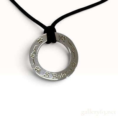 Bvlgari Save the Children Sterling Silver Ring Pendant Necklace. This Bvlgari pendant necklace 