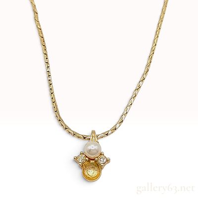 Vintage Christian Dior Faux Pearl and Crystal Pendant Necklace. This vintage Christian Dior 