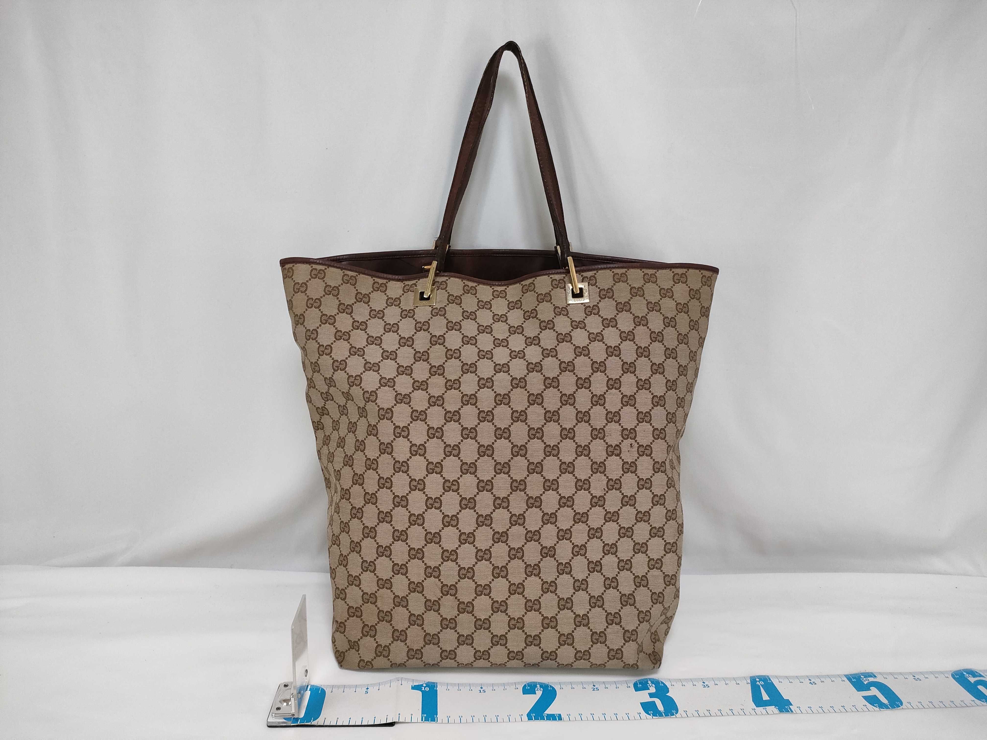 A Vintage Gucci GG Monogram Canvas and Brown Leather Tote Bag
