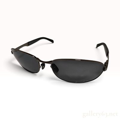 Giorgio Armani 1521 Gunmetal Sunglasses with Case. This Giorgio Armani pair of sunglasses is 