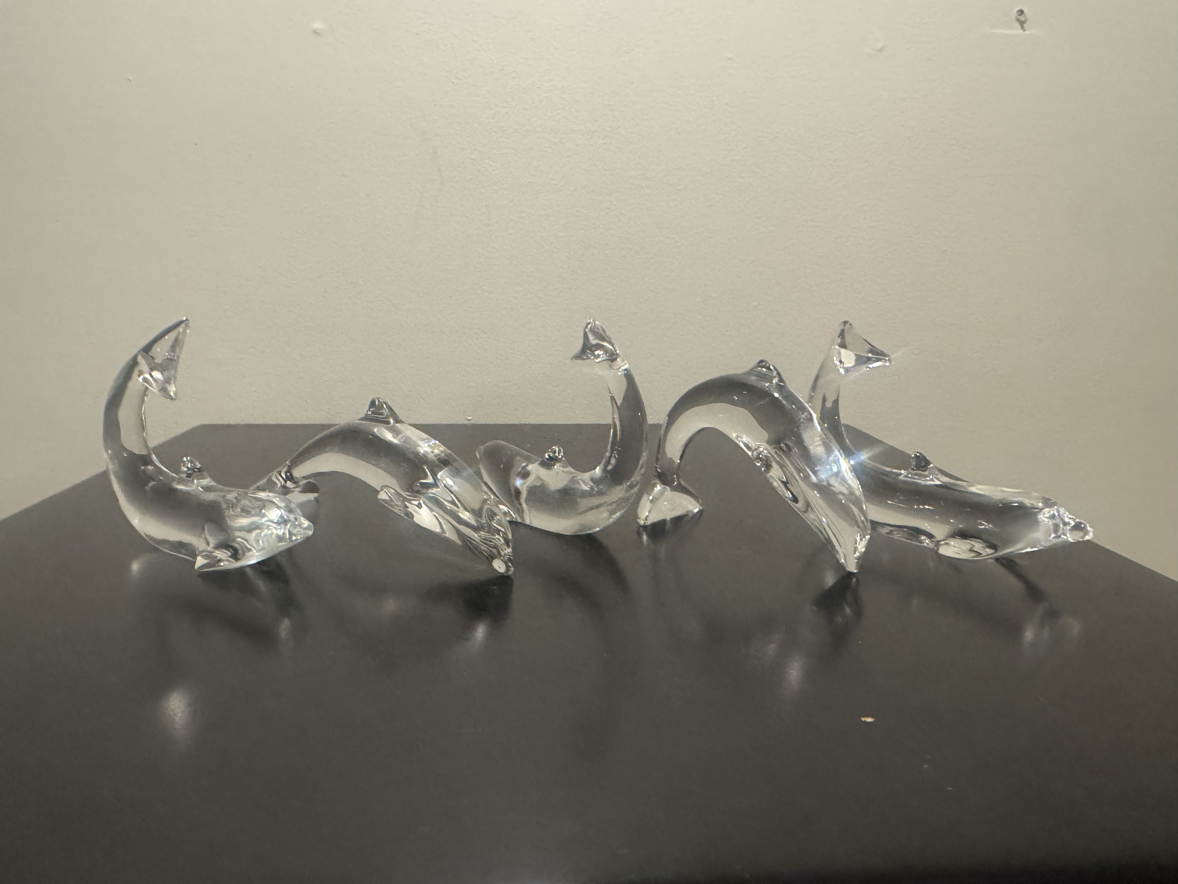 BACCARAT (French) -- Group of Five Clear Crystal Dolphin Sculptures, Signed
