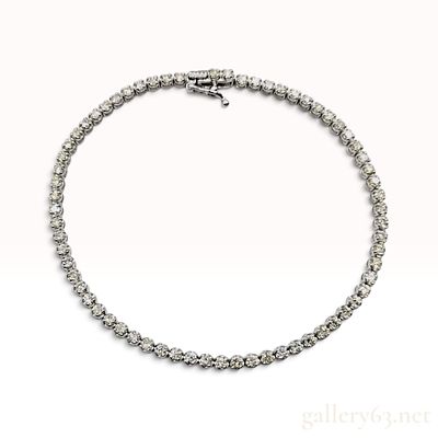 2.00ctw Natural Diamond 18KWG Tennis Bracelet. This tennis bracelet is crafted from 18KWG and 
