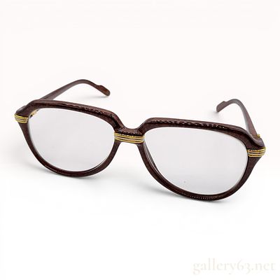 Cartier Vitesse Mottled Brown and Gold-Toned Eyeglasses. A pair of Cartier Vitesse eyeglasses 