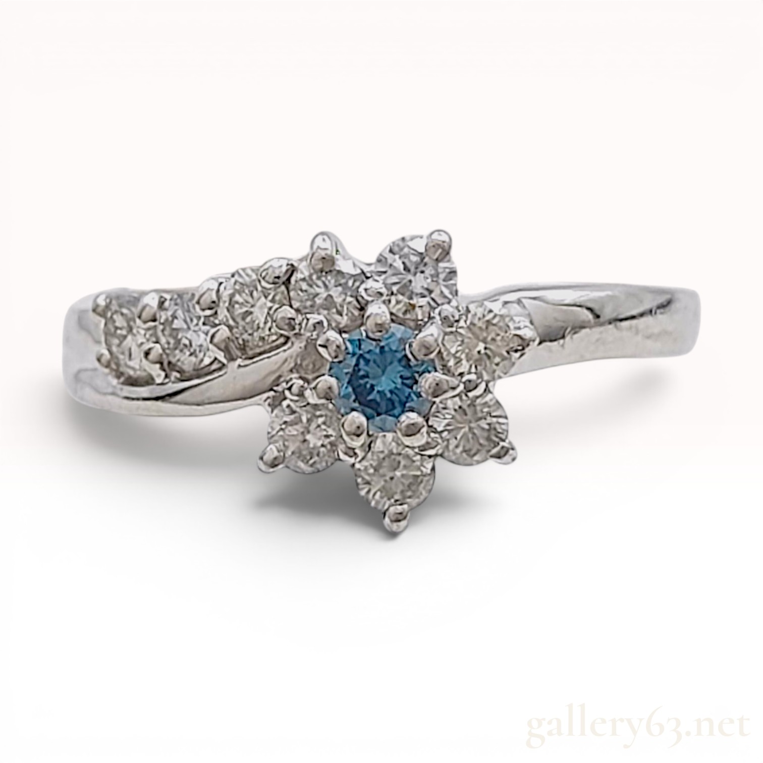 Platinum Flower Motif Bypass Ring with Irradiated Natural Blue Diamond and Diamond Accents