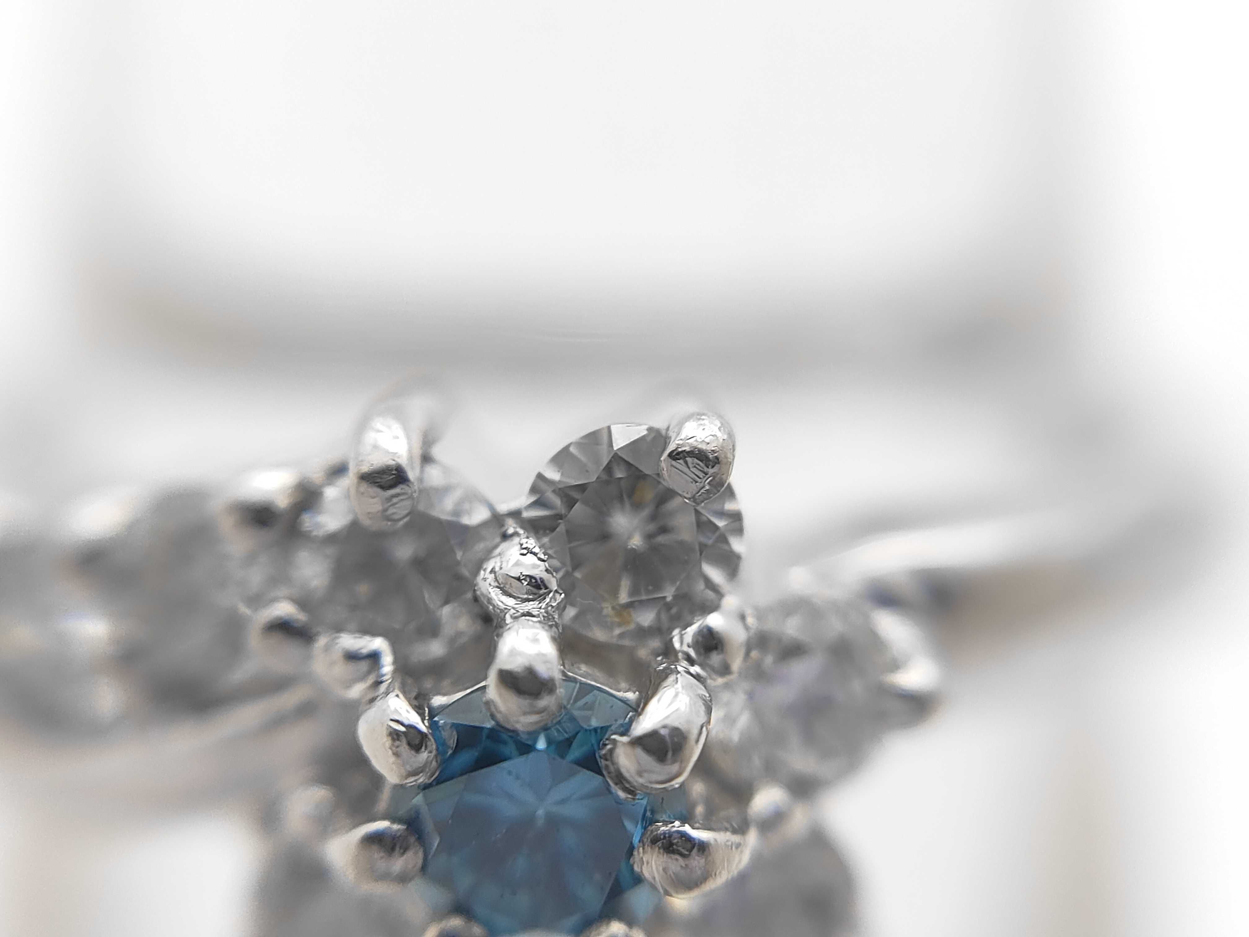 Platinum Flower Motif Bypass Ring with Irradiated Natural Blue Diamond and Diamond Accents