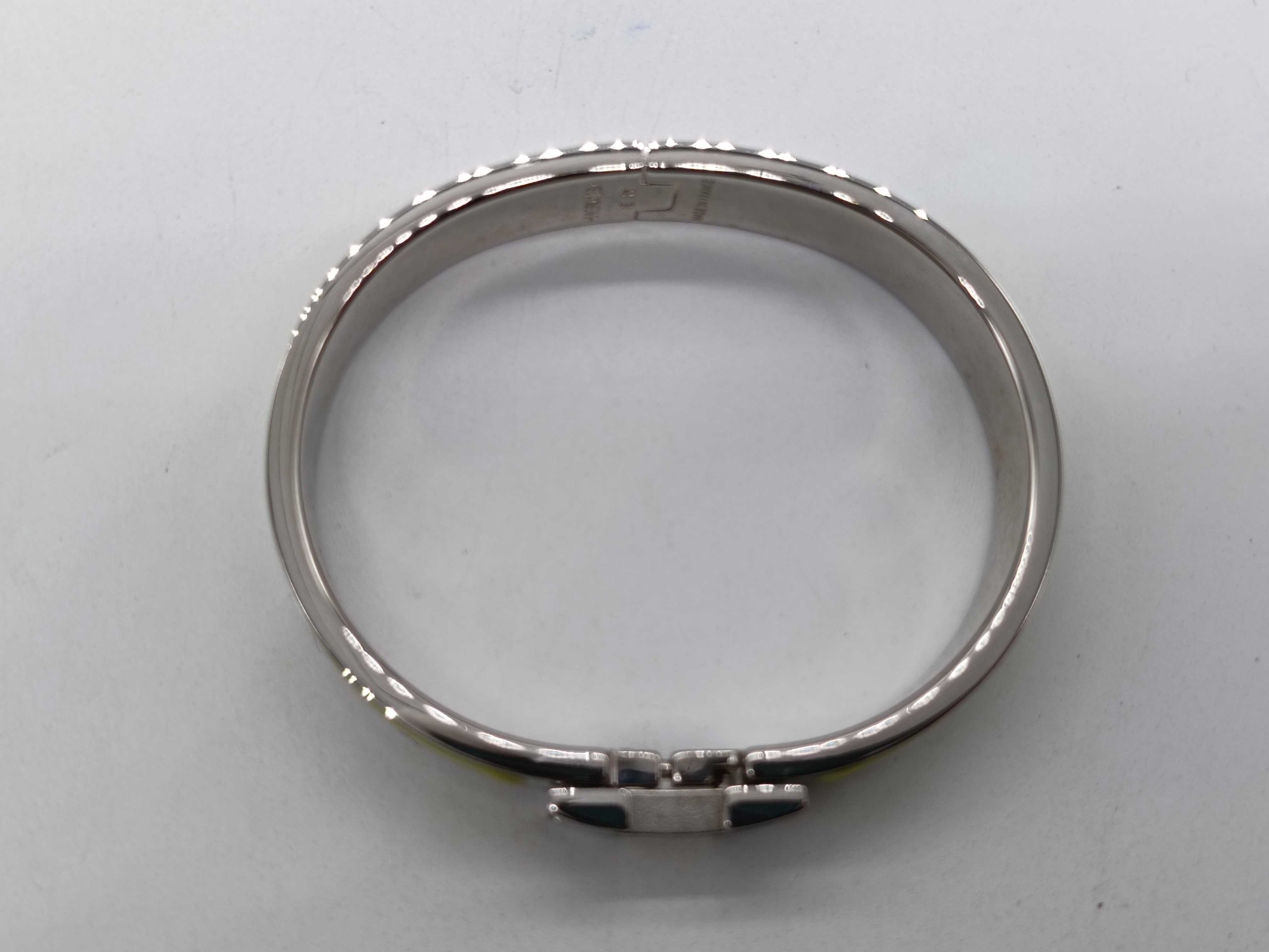 Hermes Clic H bracelet in citron yellow enamel and palladium-plated metal