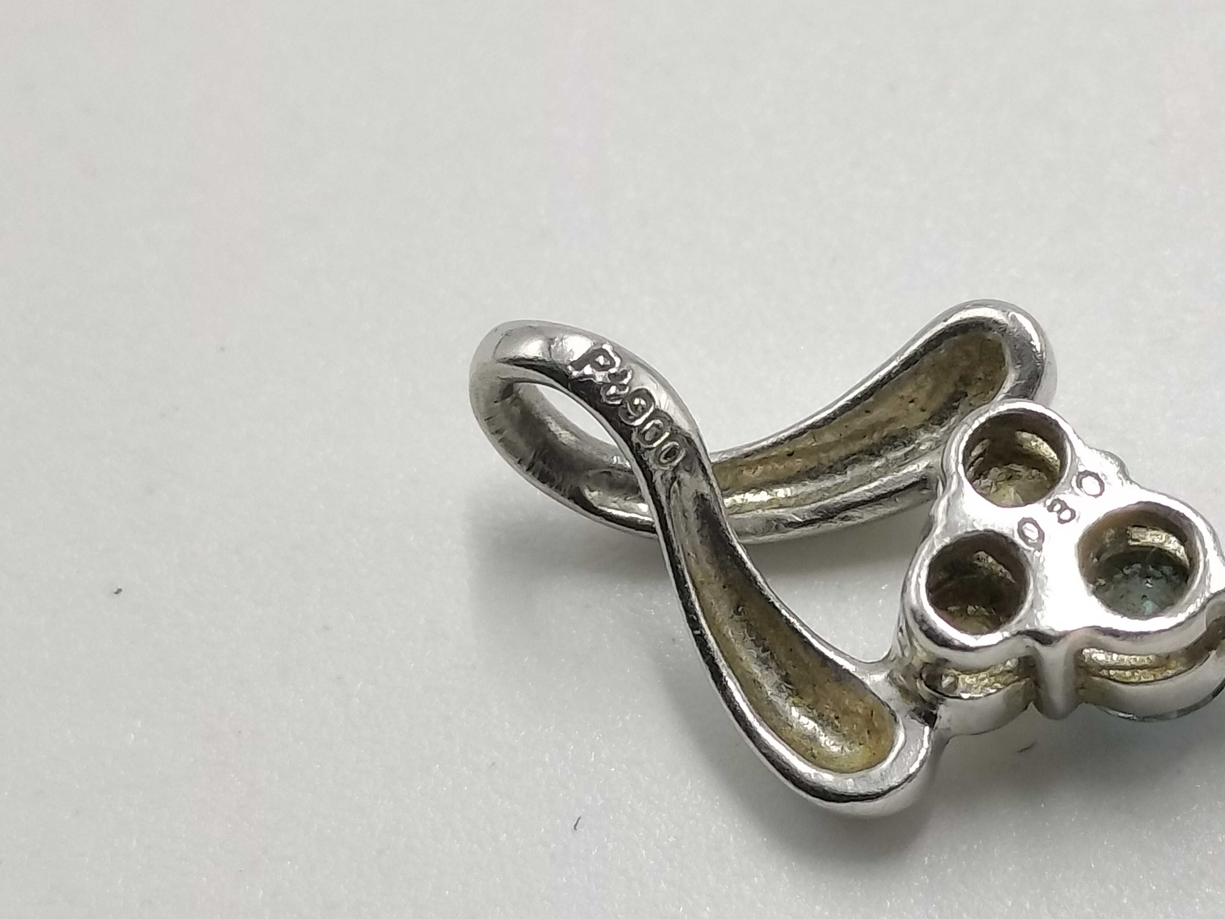 Platinum Blue Diamond and Colorless Diamond Bypass Pendant
