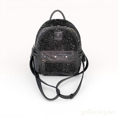 MCM Stark Bebe Boo X-Mini Crystal Embellished Black Leather Backpack. An MCM Stark Bebe Boo 