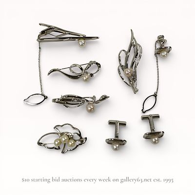An Eight-Piece Collection of Silver and Cultured Pearl Jewelry, Mid 20th C. An eight-piece 