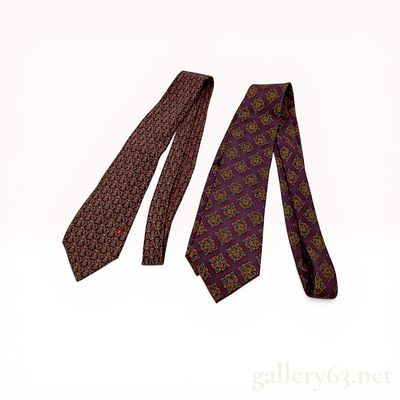 Two Chanel Silk Men's Neckties. Two Chanel silk neckties featuring distinct printed patterns 