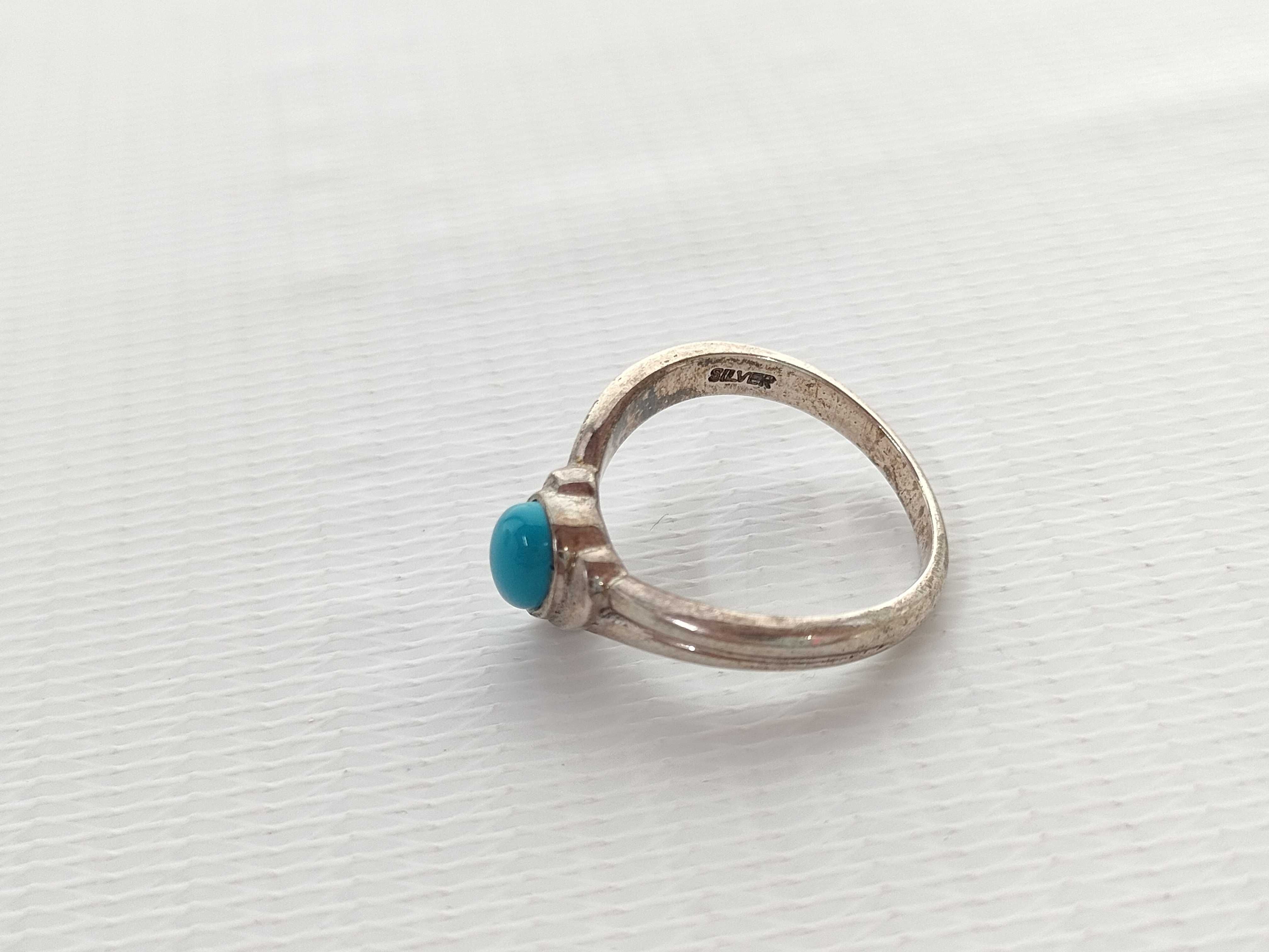 An Assortment of Four Silver and Turquoise Jewelry Items