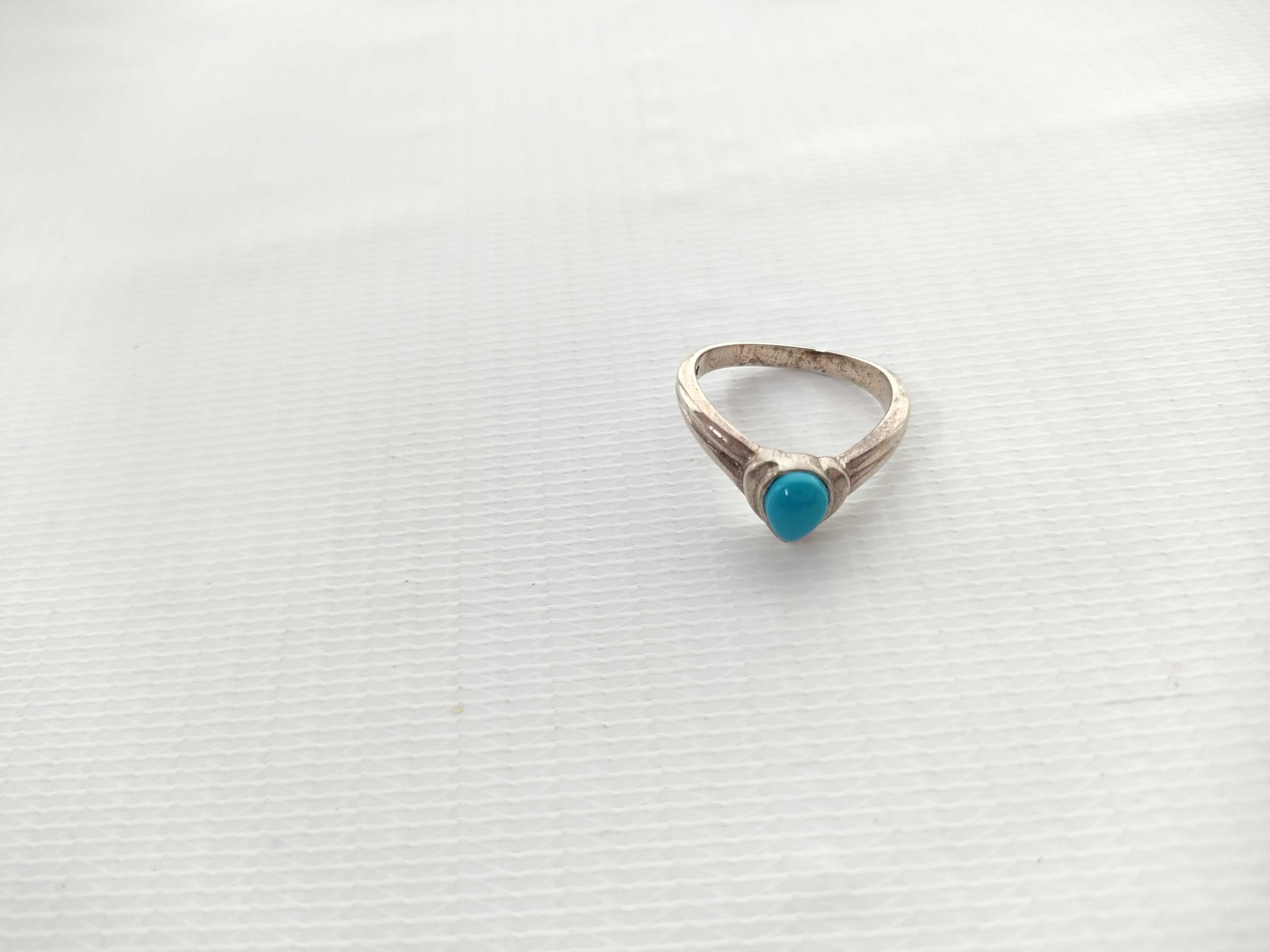 An Assortment of Four Silver and Turquoise Jewelry Items