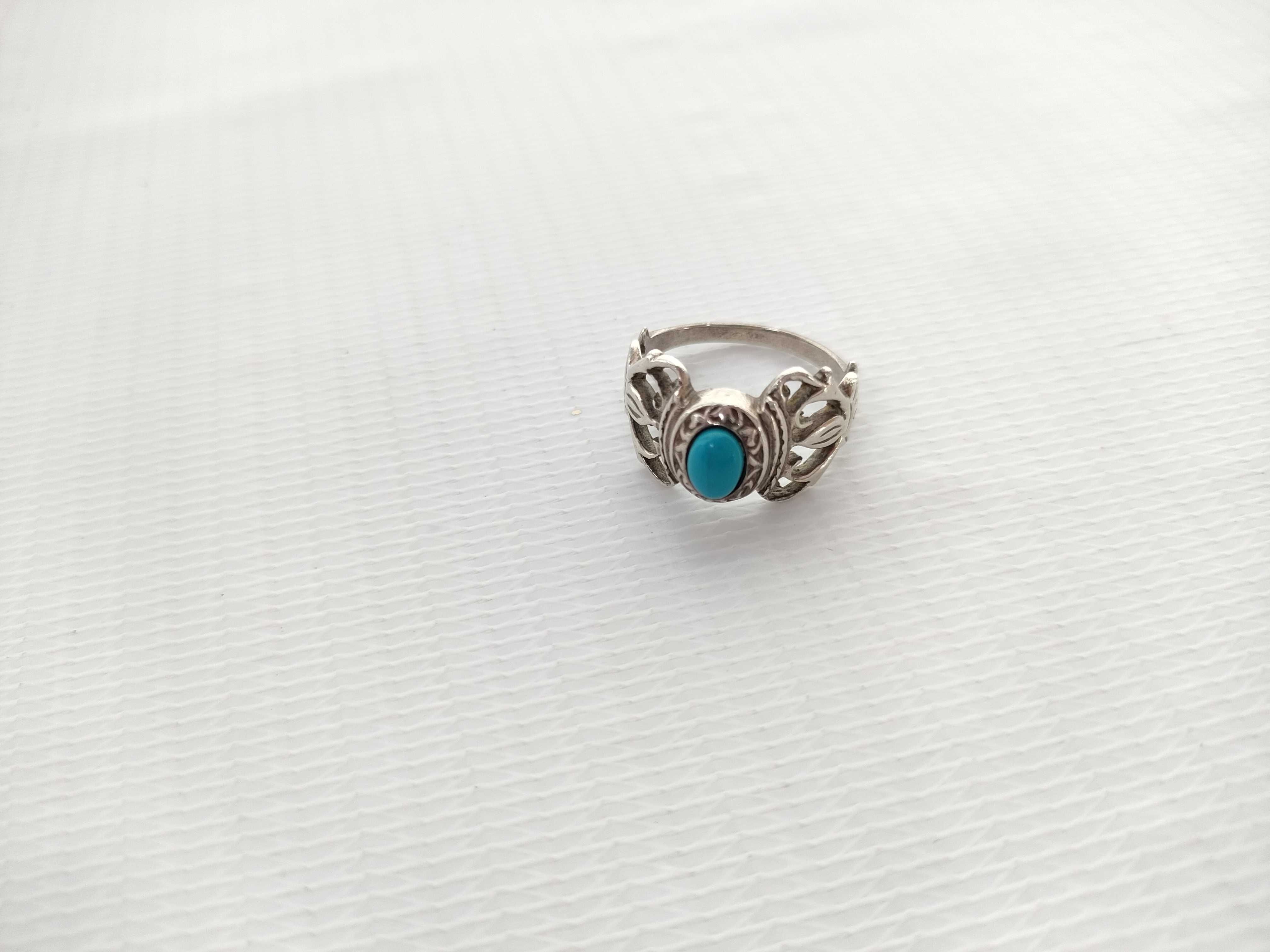 An Assortment of Four Silver and Turquoise Jewelry Items