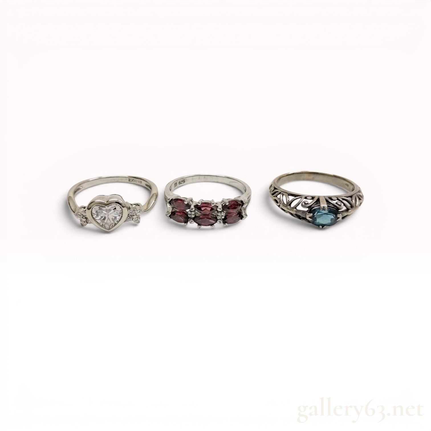 A Trio of Sterling Silver and Gemstone Rings