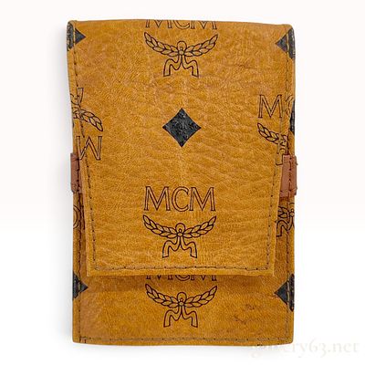 Vintage MCM Cognac Visetos Monogram Leather Belt Pouch. This vintage MCM pouch is constructed 