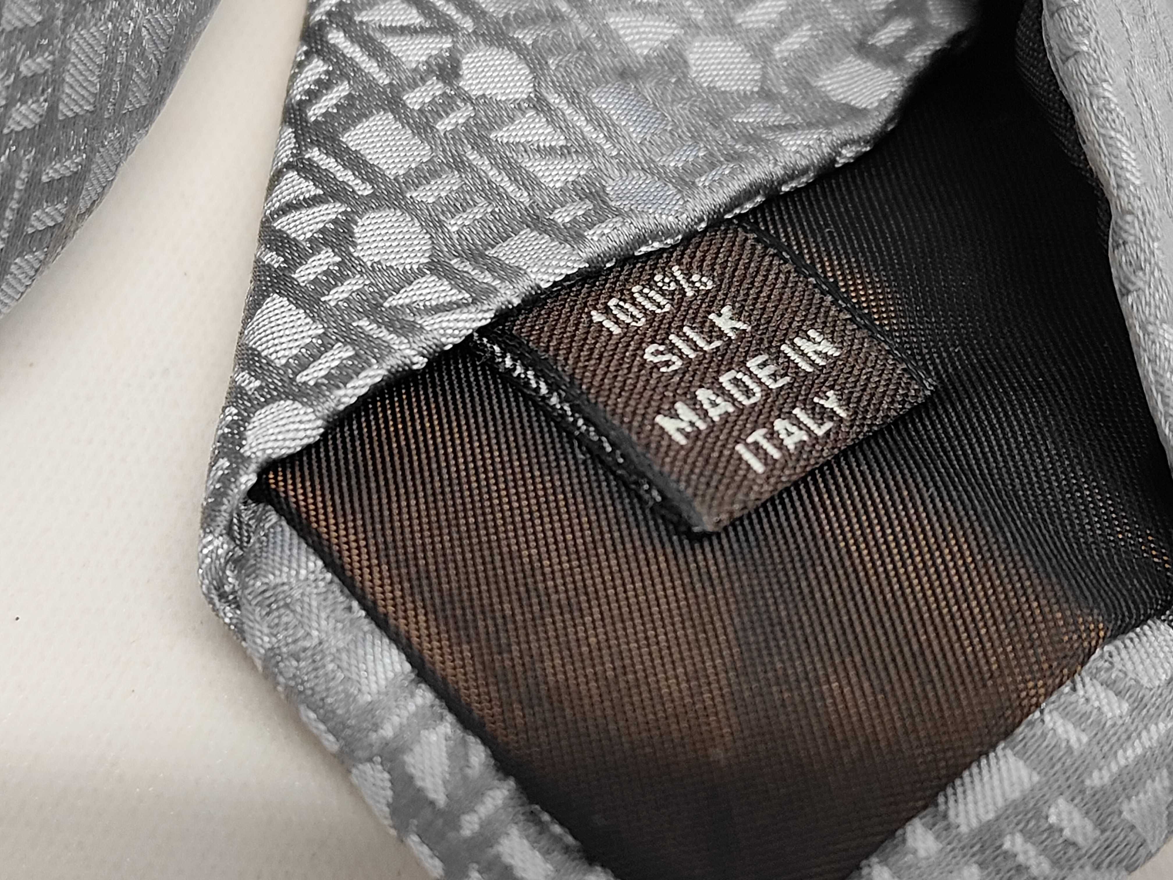 Three Designer Silk Neckties including Celine Paris and Ermenegildo Zegna