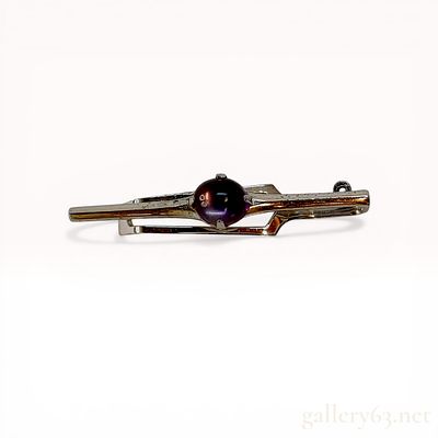 Modernist Silver and Amethyst Cabochon Tie Clip. Mid-to-late 20th-century silver tie clip 