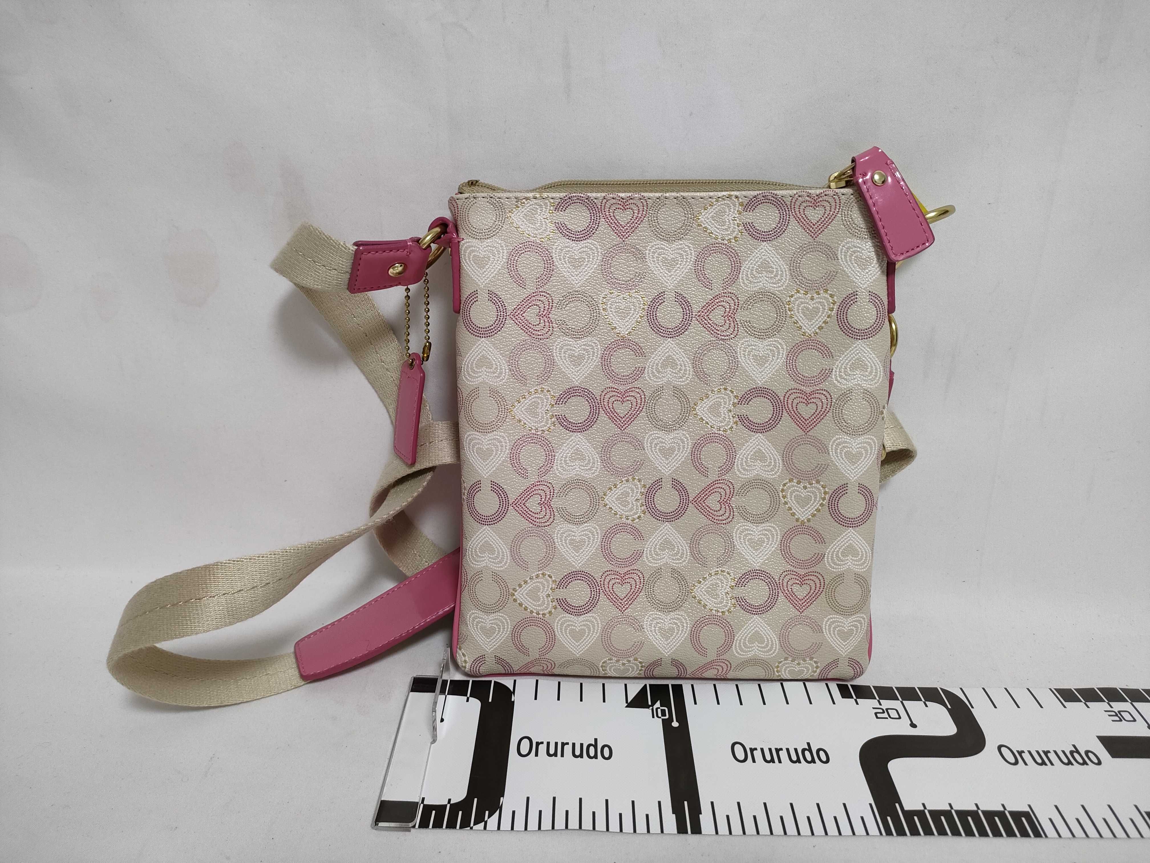 Coach Signature Heart Pattern Coated Canvas Swingpack Crossbody Bag