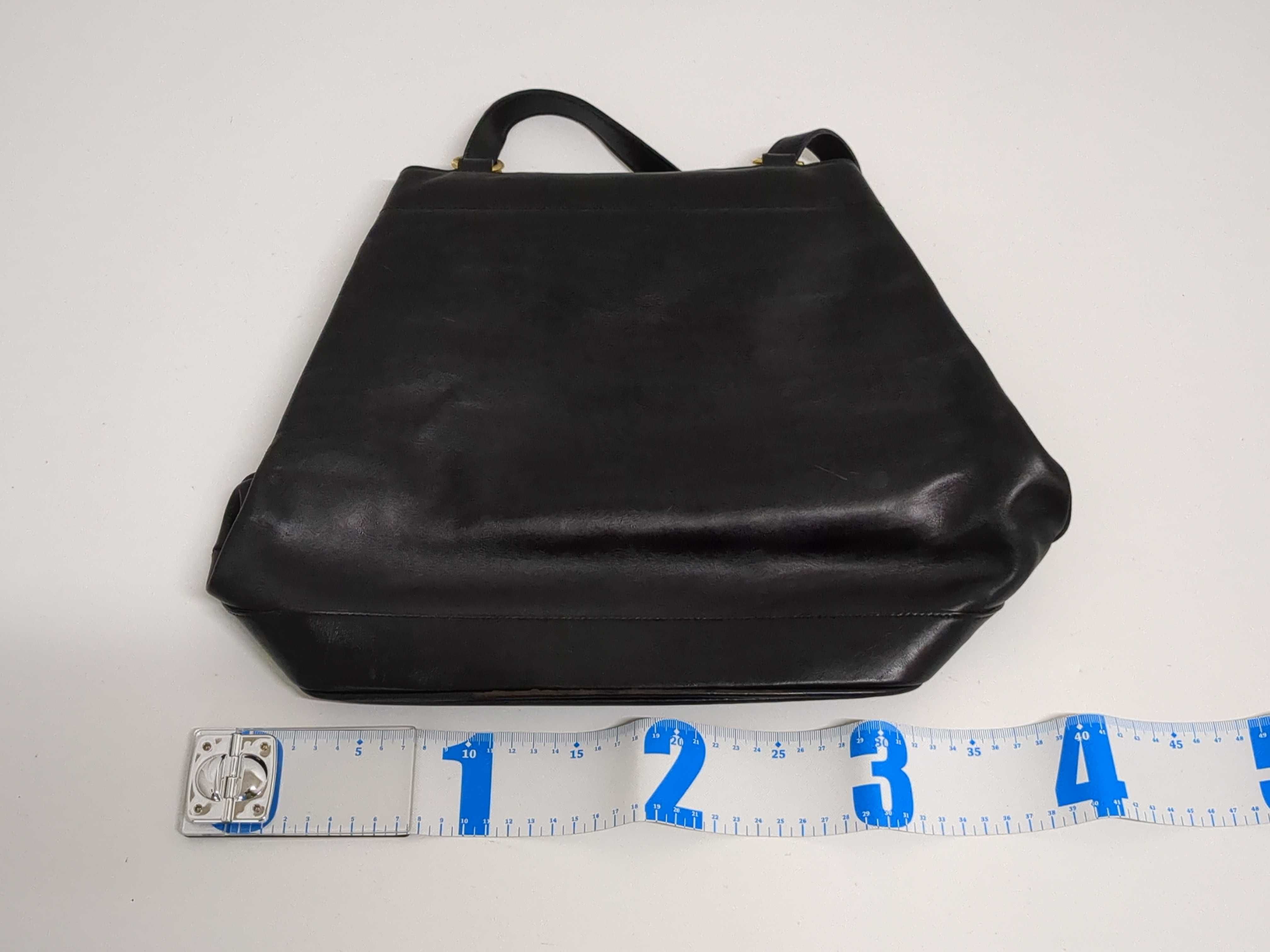 Two Salvatore Ferragamo and Coach Black Leather Handbags