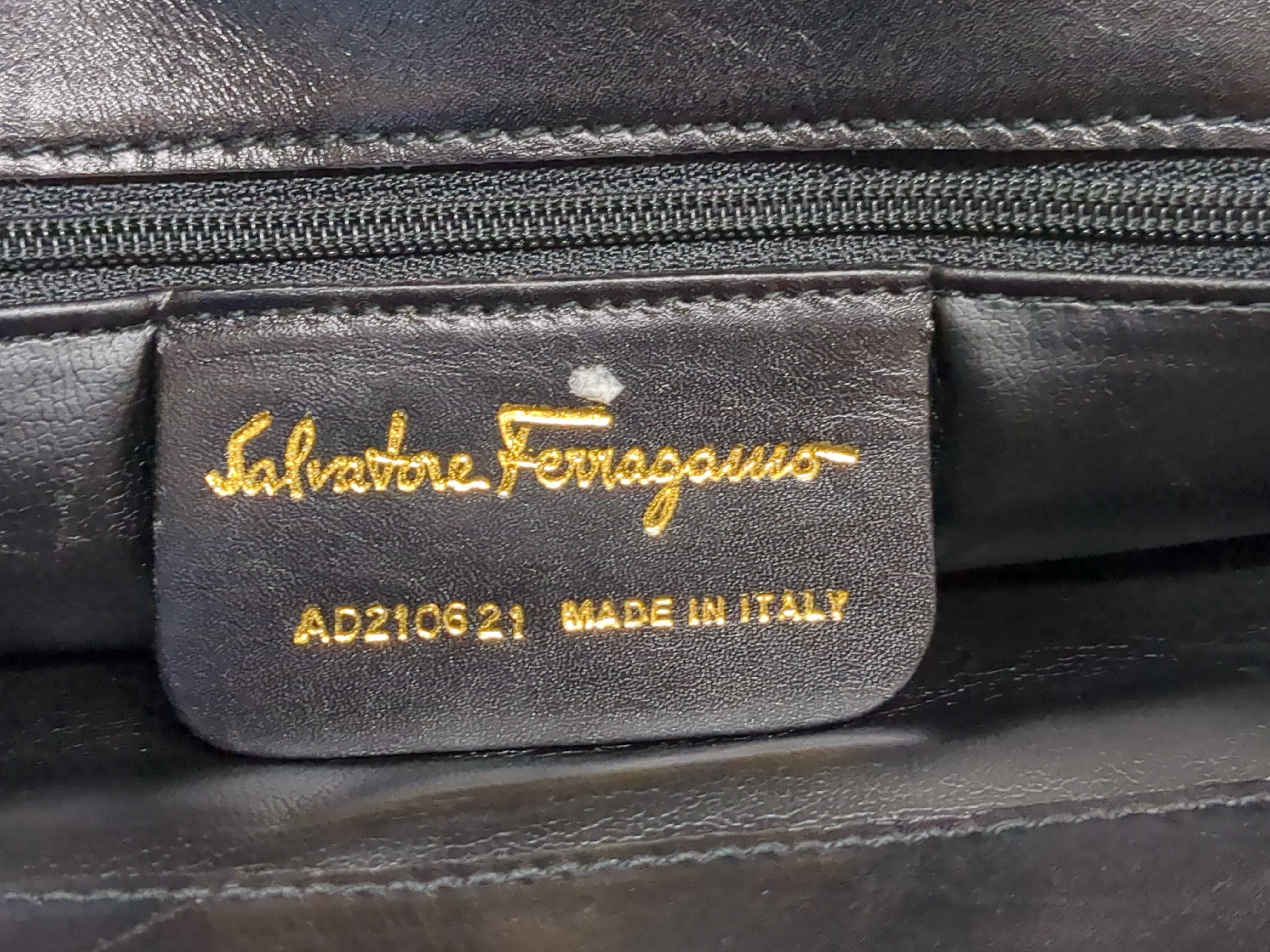 Two Salvatore Ferragamo and Coach Black Leather Handbags
