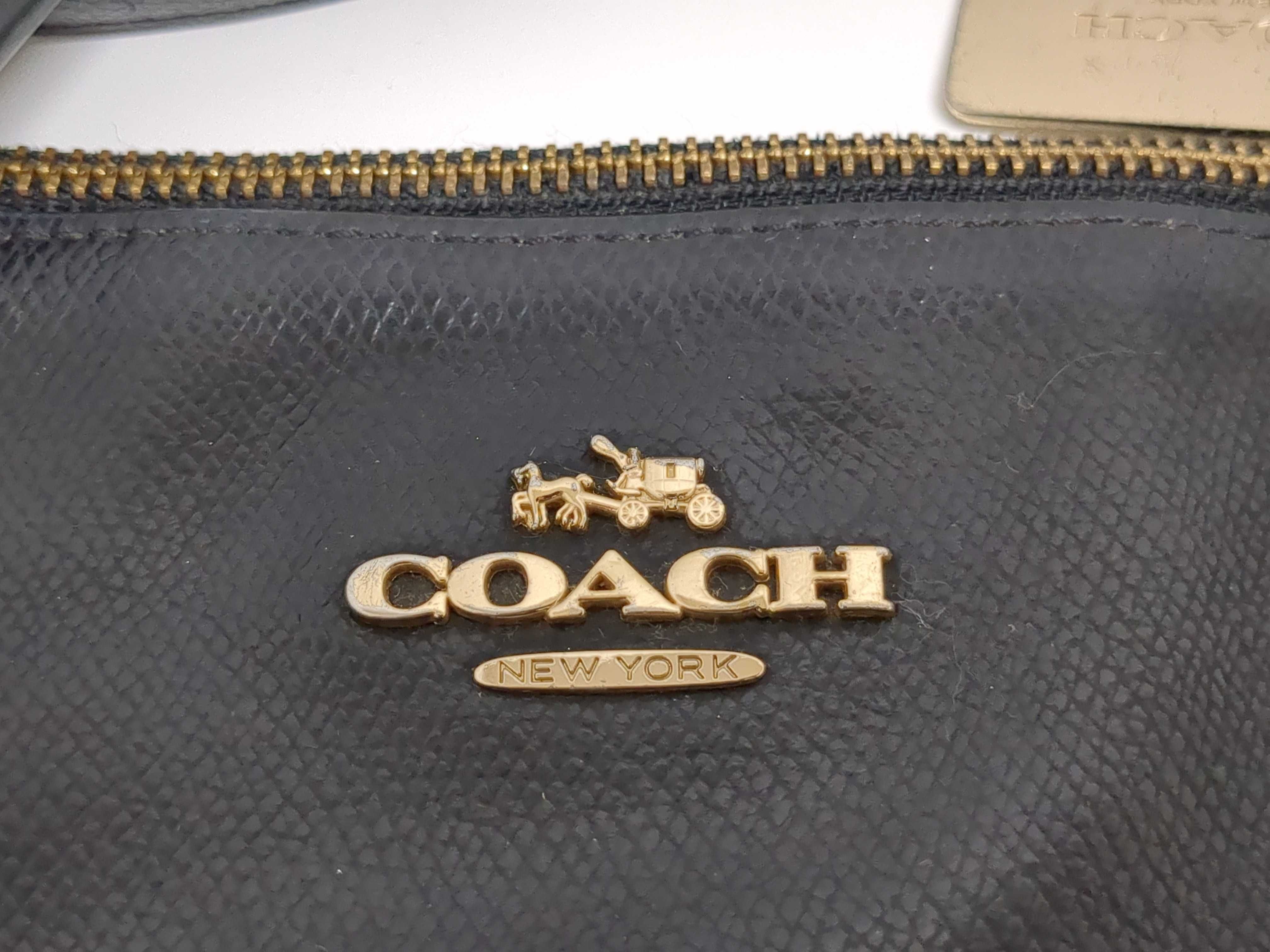 Two Salvatore Ferragamo and Coach Black Leather Handbags