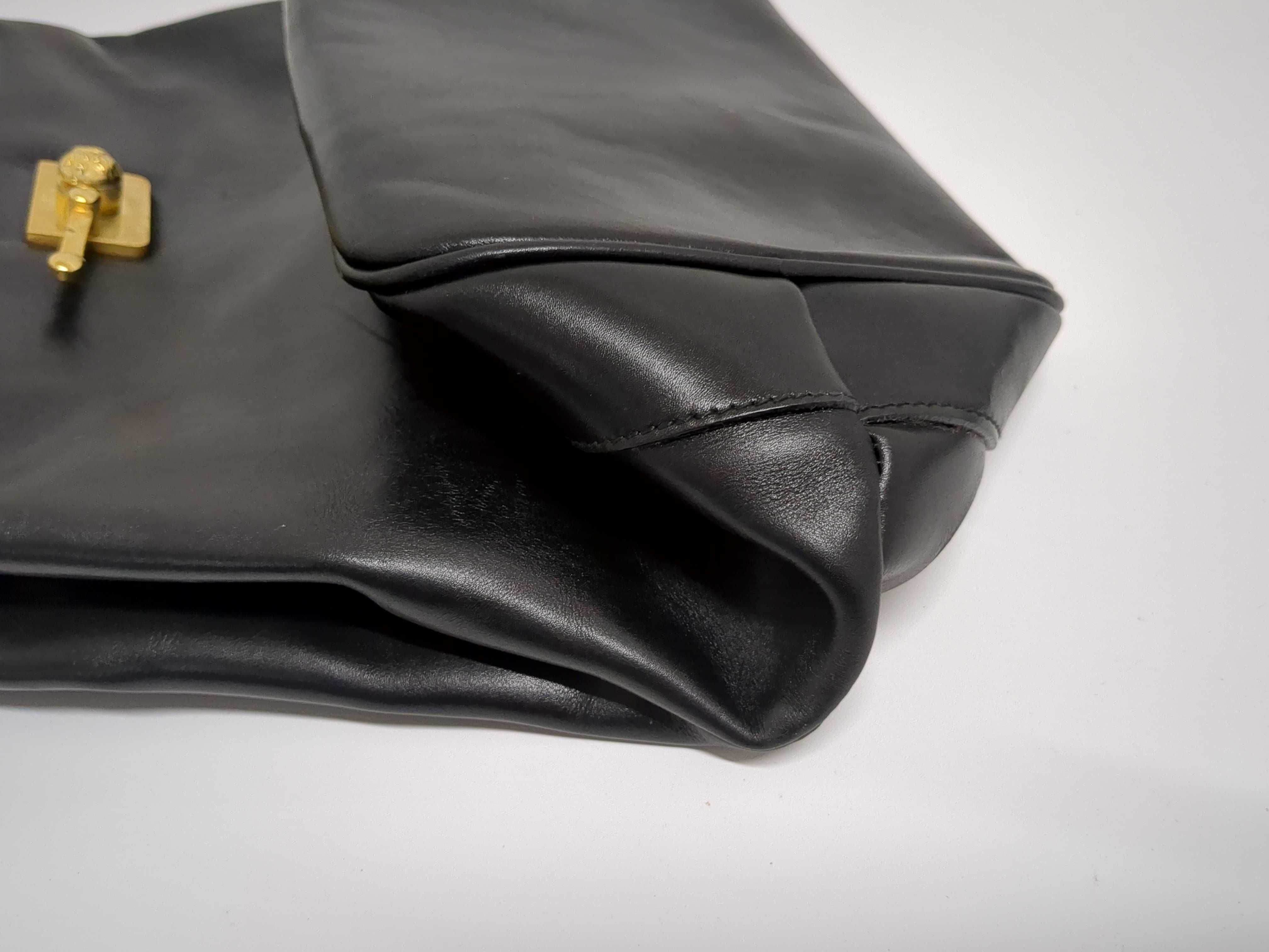 Two Salvatore Ferragamo and Coach Black Leather Handbags
