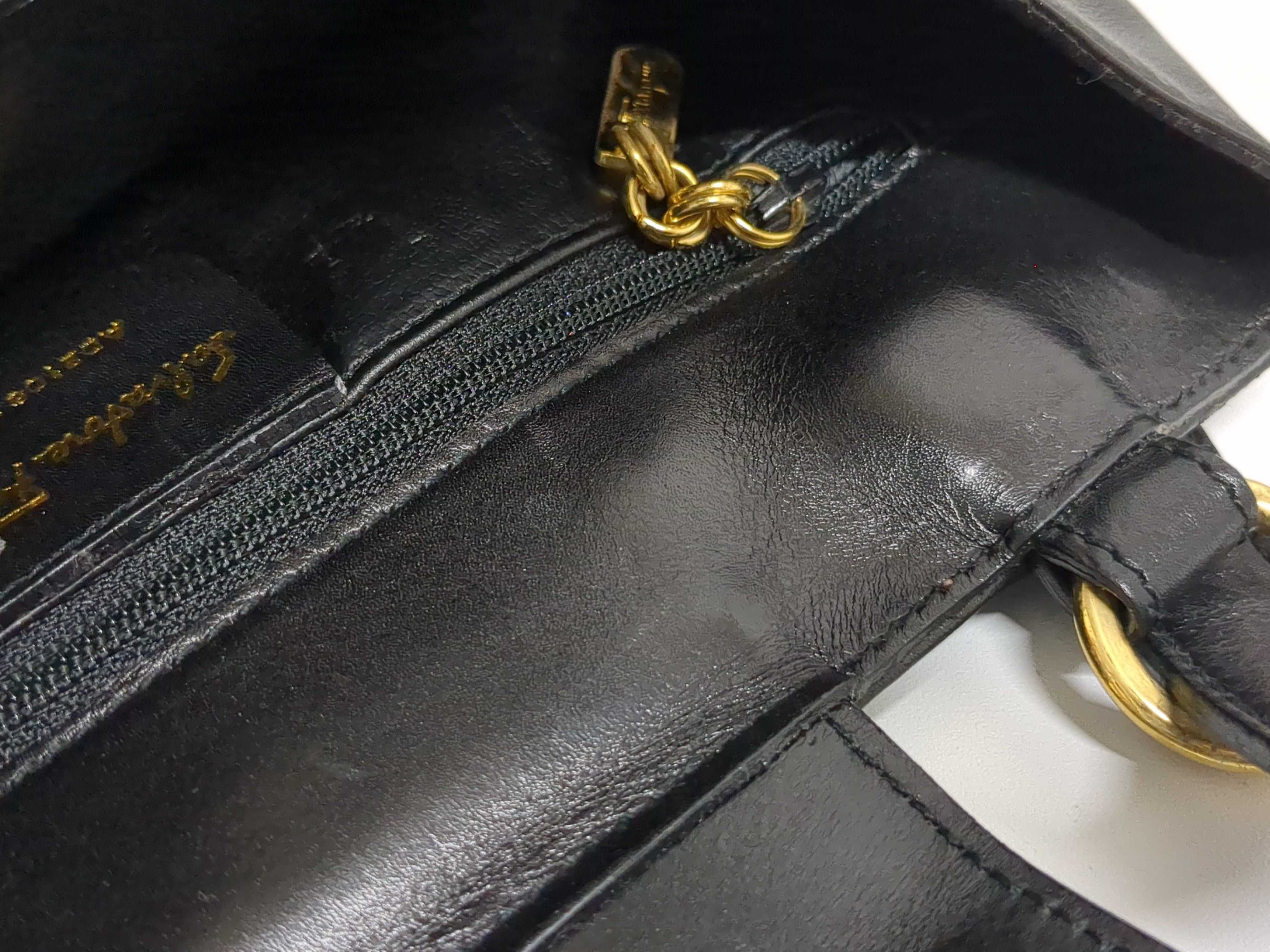 Two Salvatore Ferragamo and Coach Black Leather Handbags