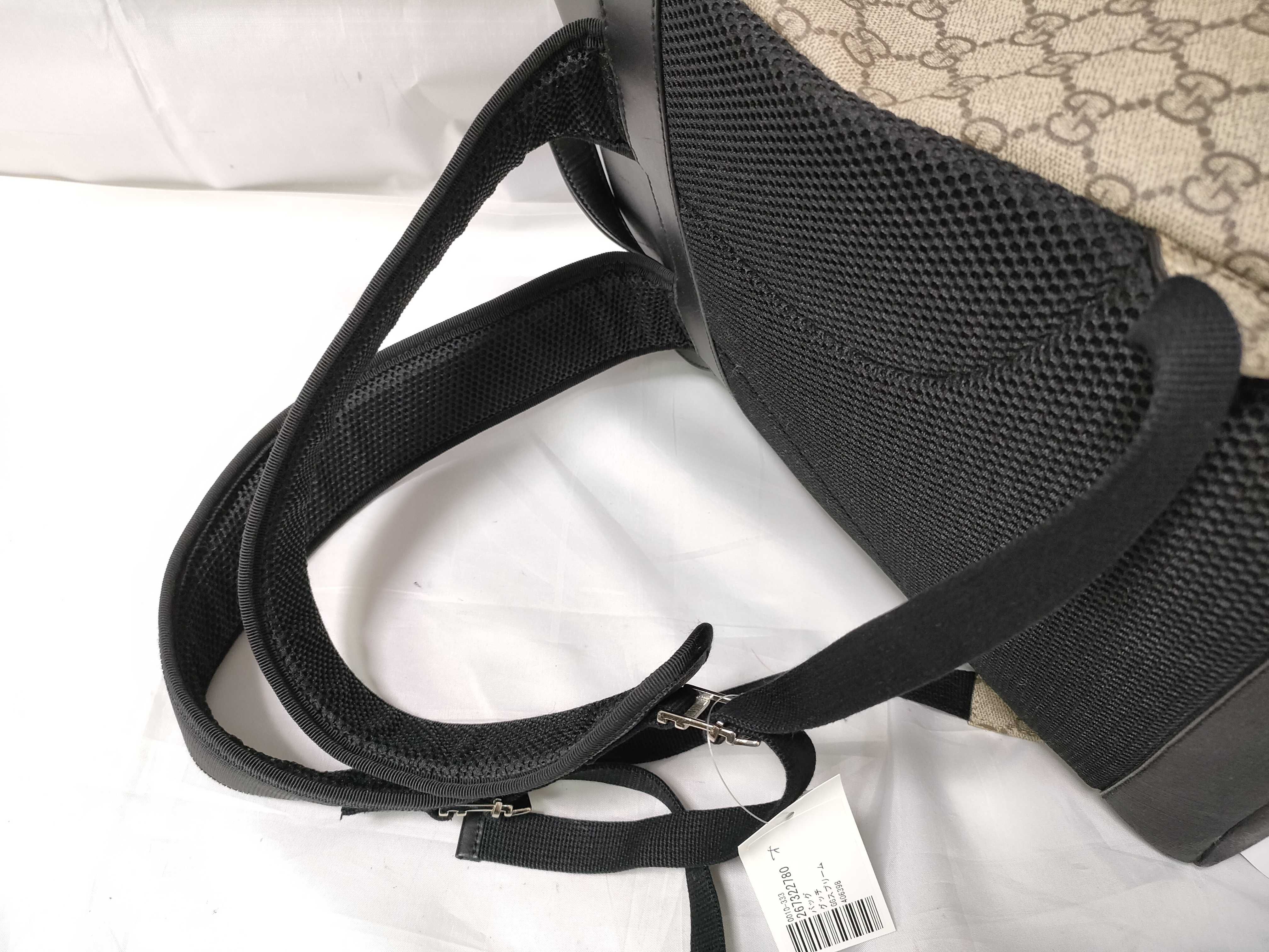 Gucci GG Supreme Monogram Buckle Backpack in Beige and Black