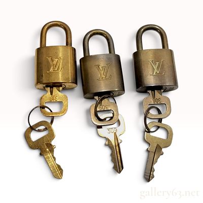 Three Vintage Louis Vuitton Brass Padlocks and Matching Keys. This trio of Louis Vuitton 