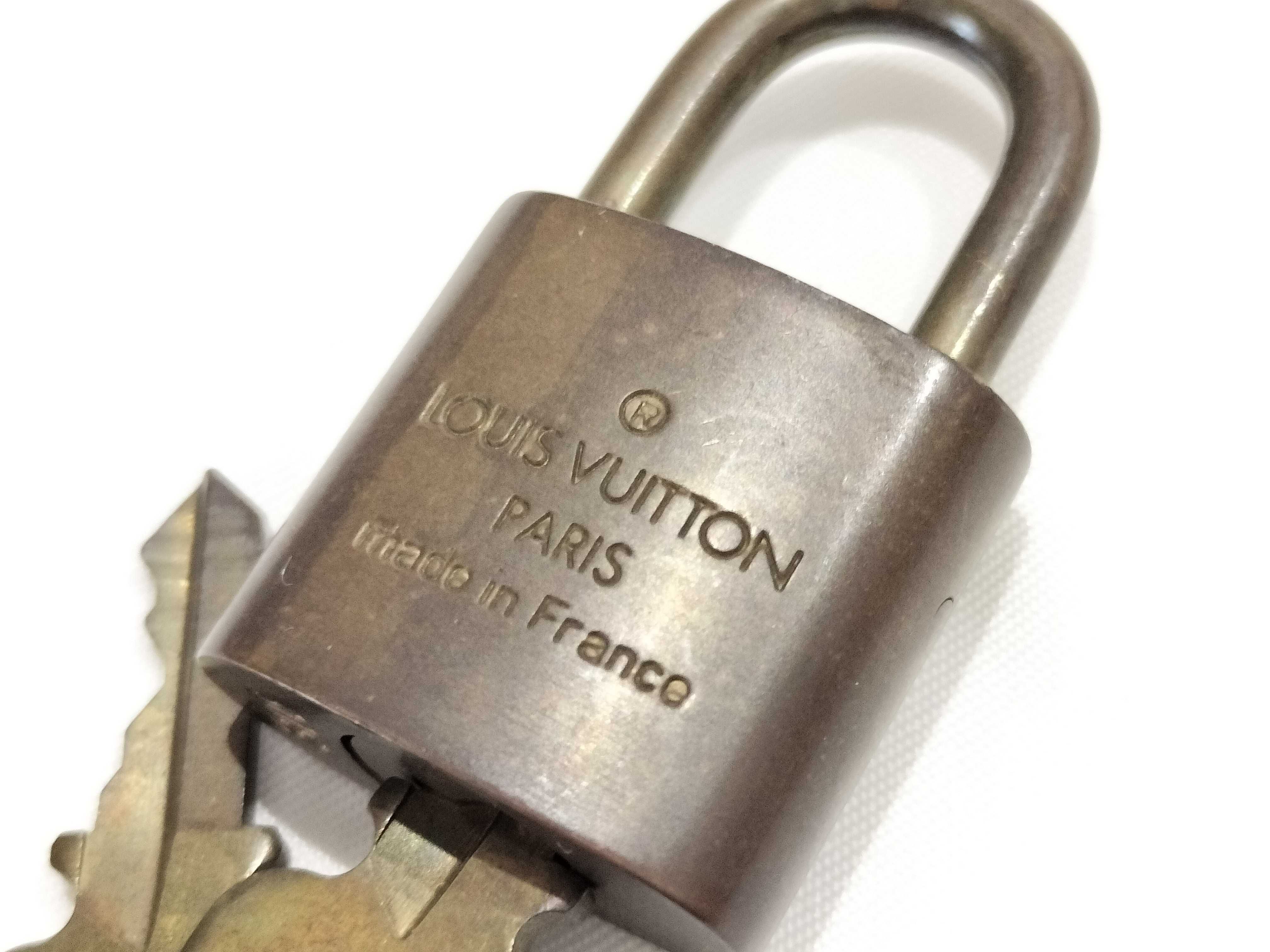 Three Vintage Louis Vuitton Brass Padlocks and Matching Keys