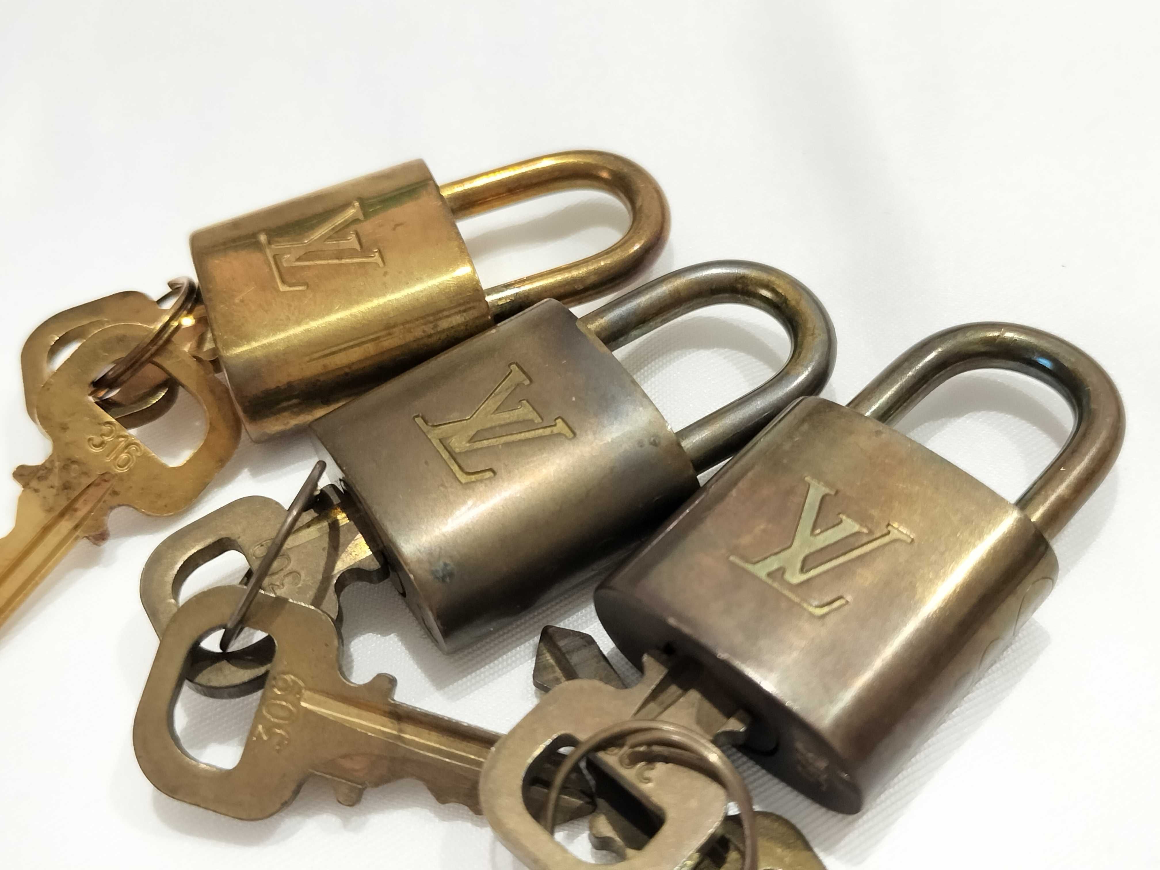 Three Vintage Louis Vuitton Brass Padlocks and Matching Keys