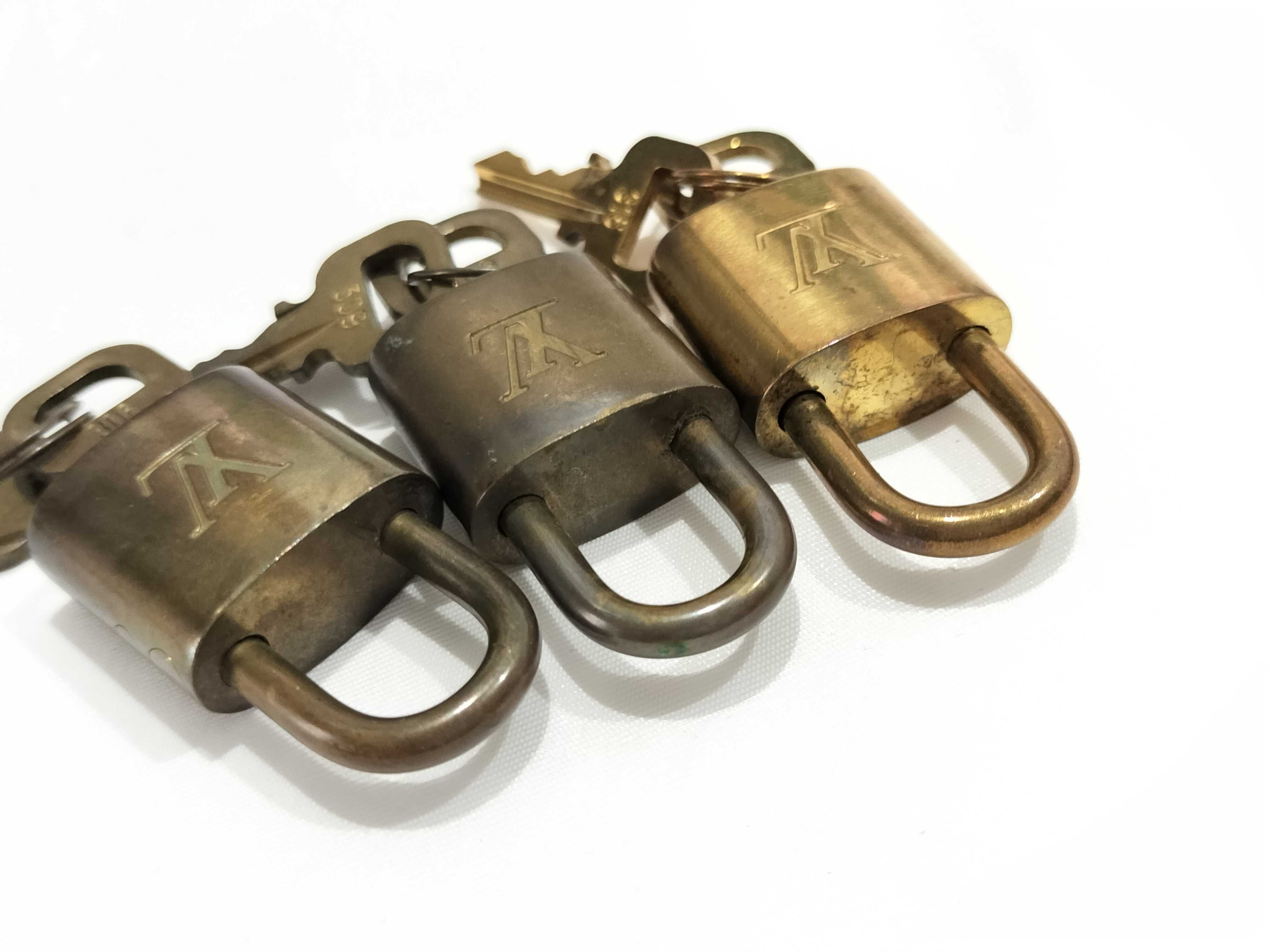 Three Vintage Louis Vuitton Brass Padlocks and Matching Keys