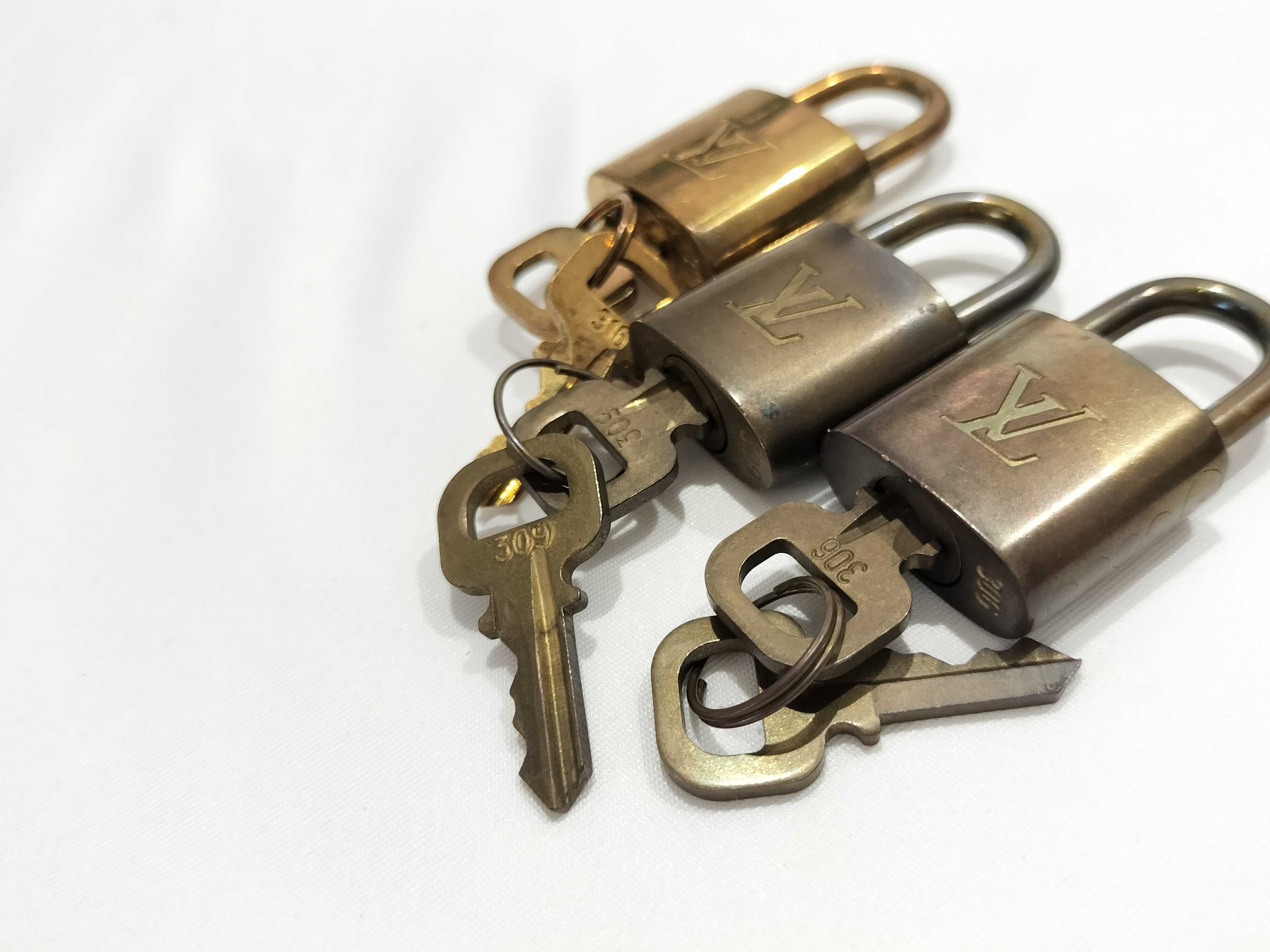 Three Vintage Louis Vuitton Brass Padlocks and Matching Keys