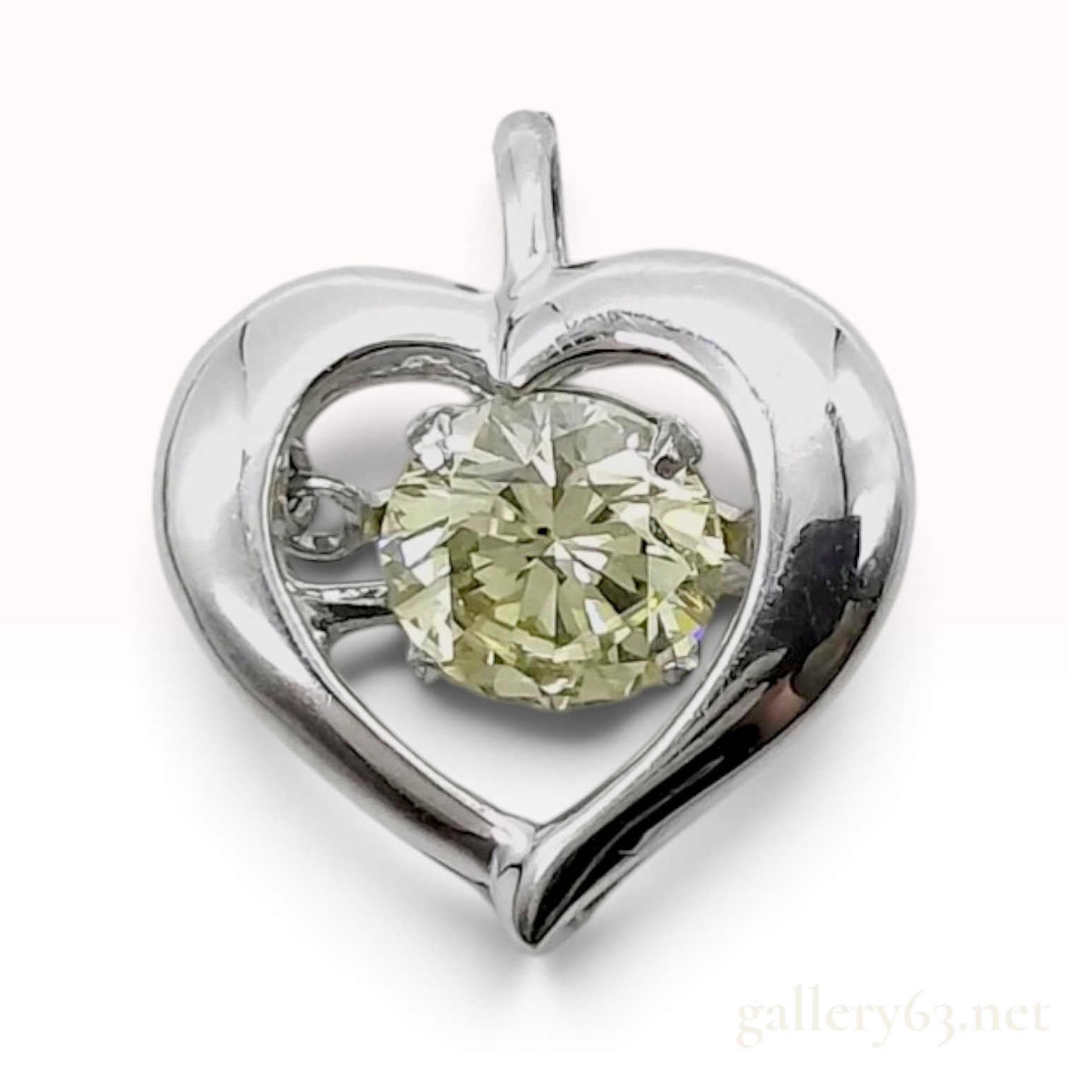 Pt900 Platinum and 0.50ct Natural Diamond Dancing Stone Heart Pendant