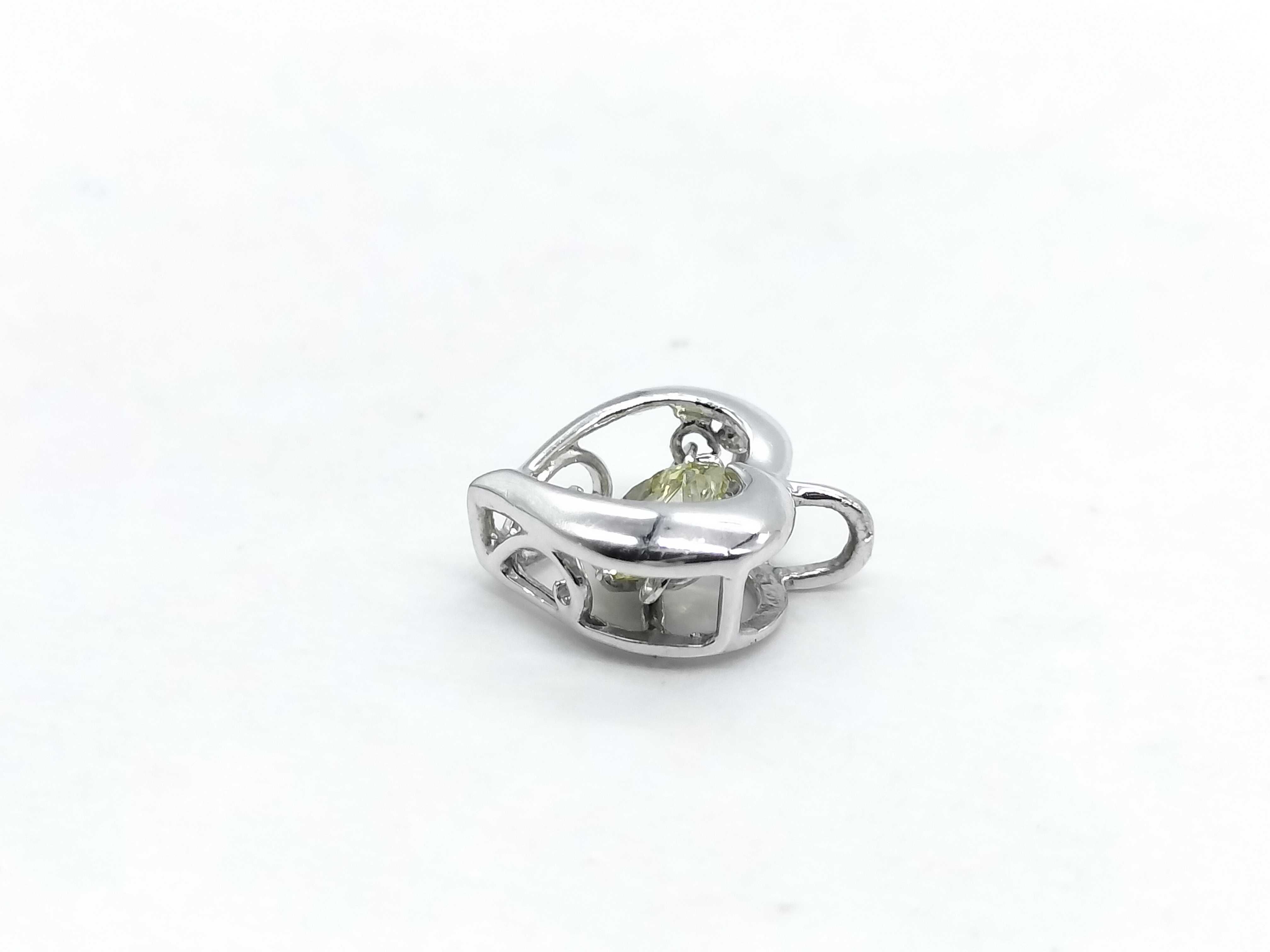 Pt900 Platinum and 0.50ct Natural Diamond Dancing Stone Heart Pendant
