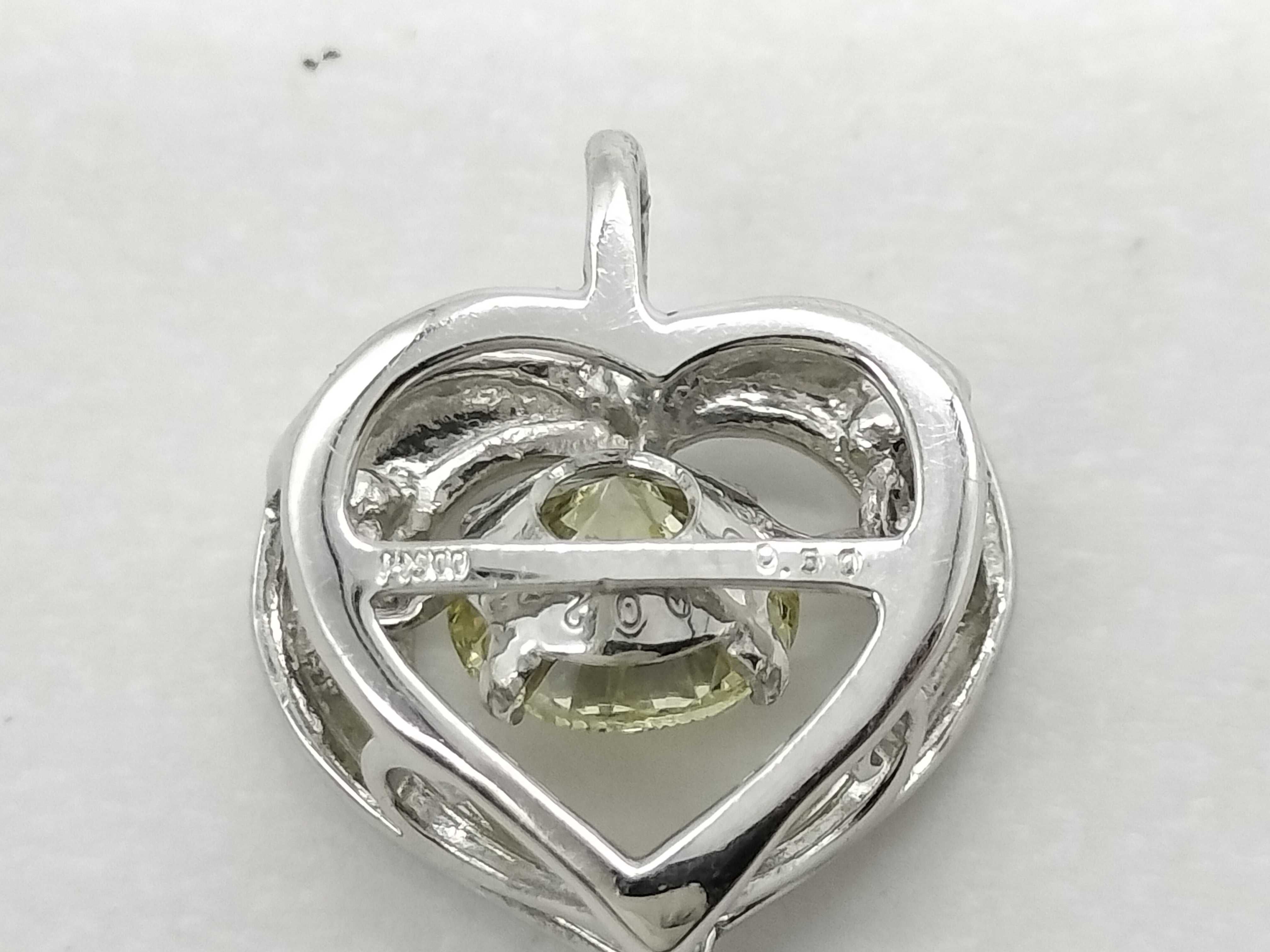 Pt900 Platinum and 0.50ct Natural Diamond Dancing Stone Heart Pendant